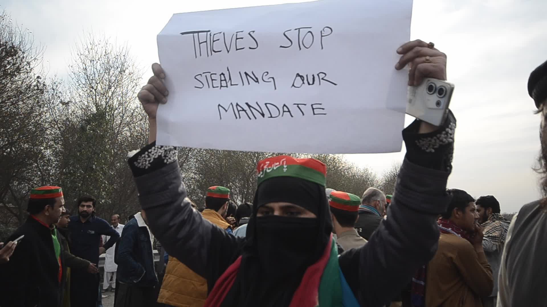 Supporters of PTI party protest against alleged rigging in general elections in Peshawar