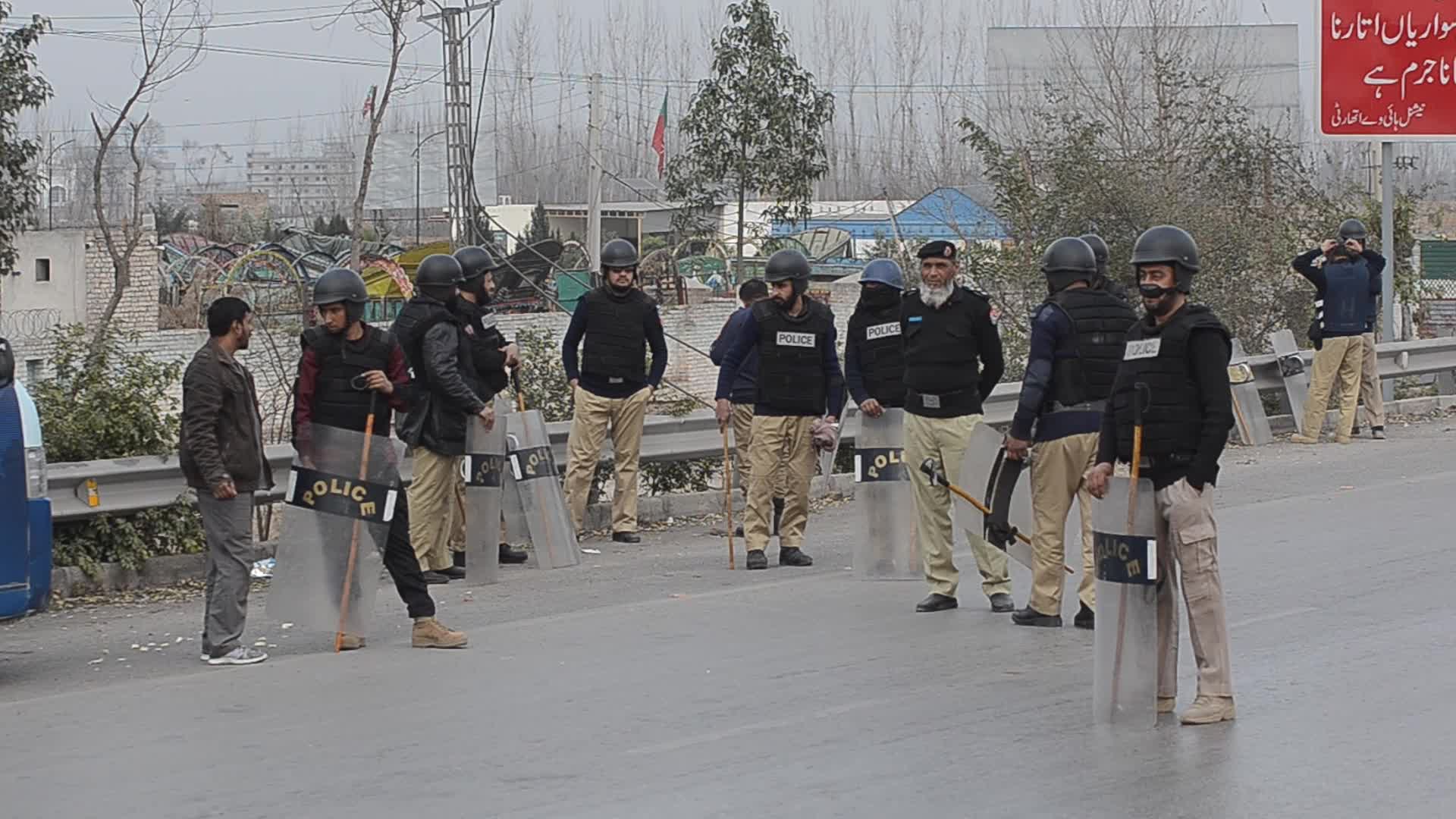 Supporters of PTI party protest against alleged rigging in general elections in Peshawar