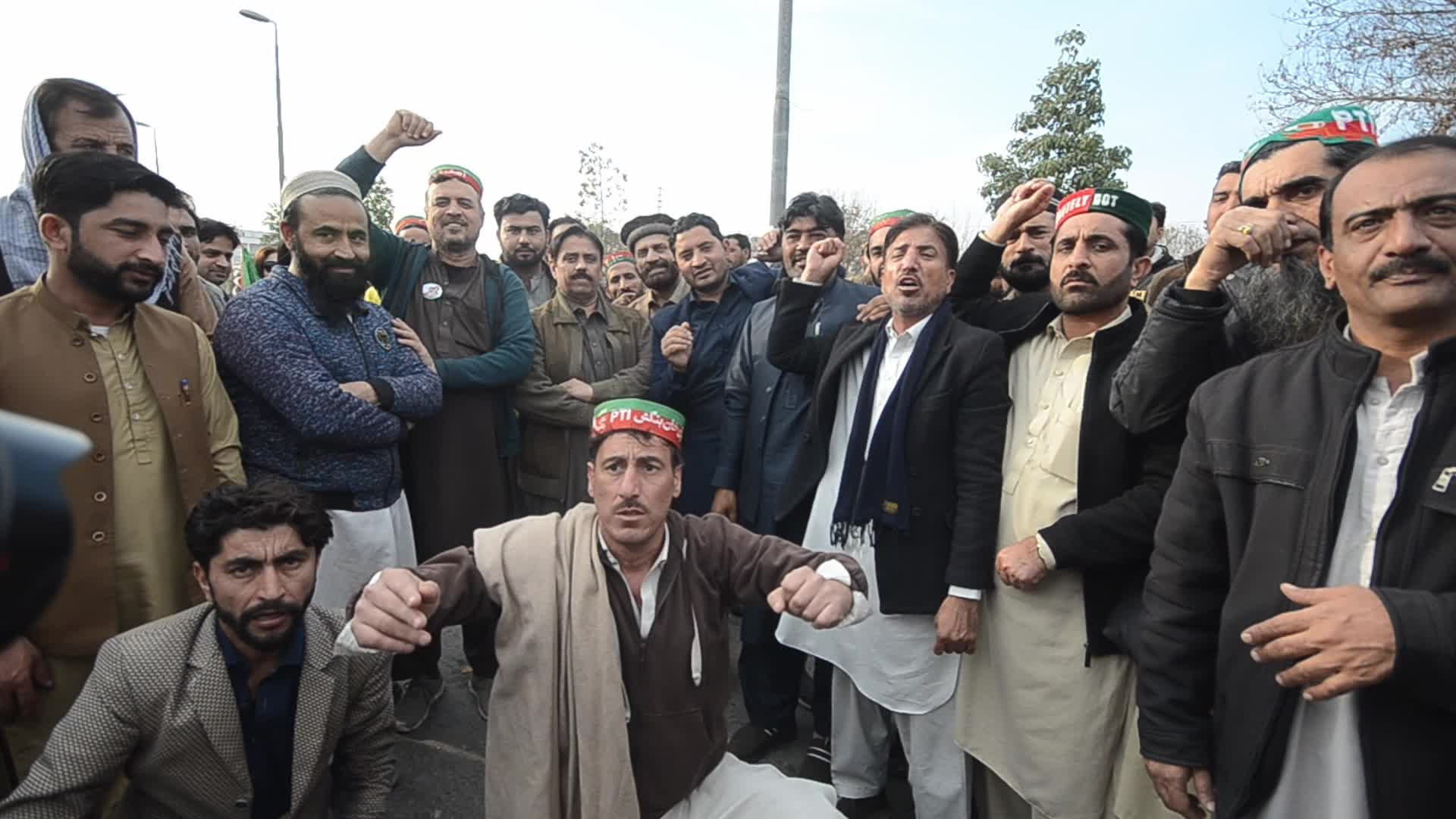 Supporters of PTI party protest against alleged rigging in general elections in Peshawar
