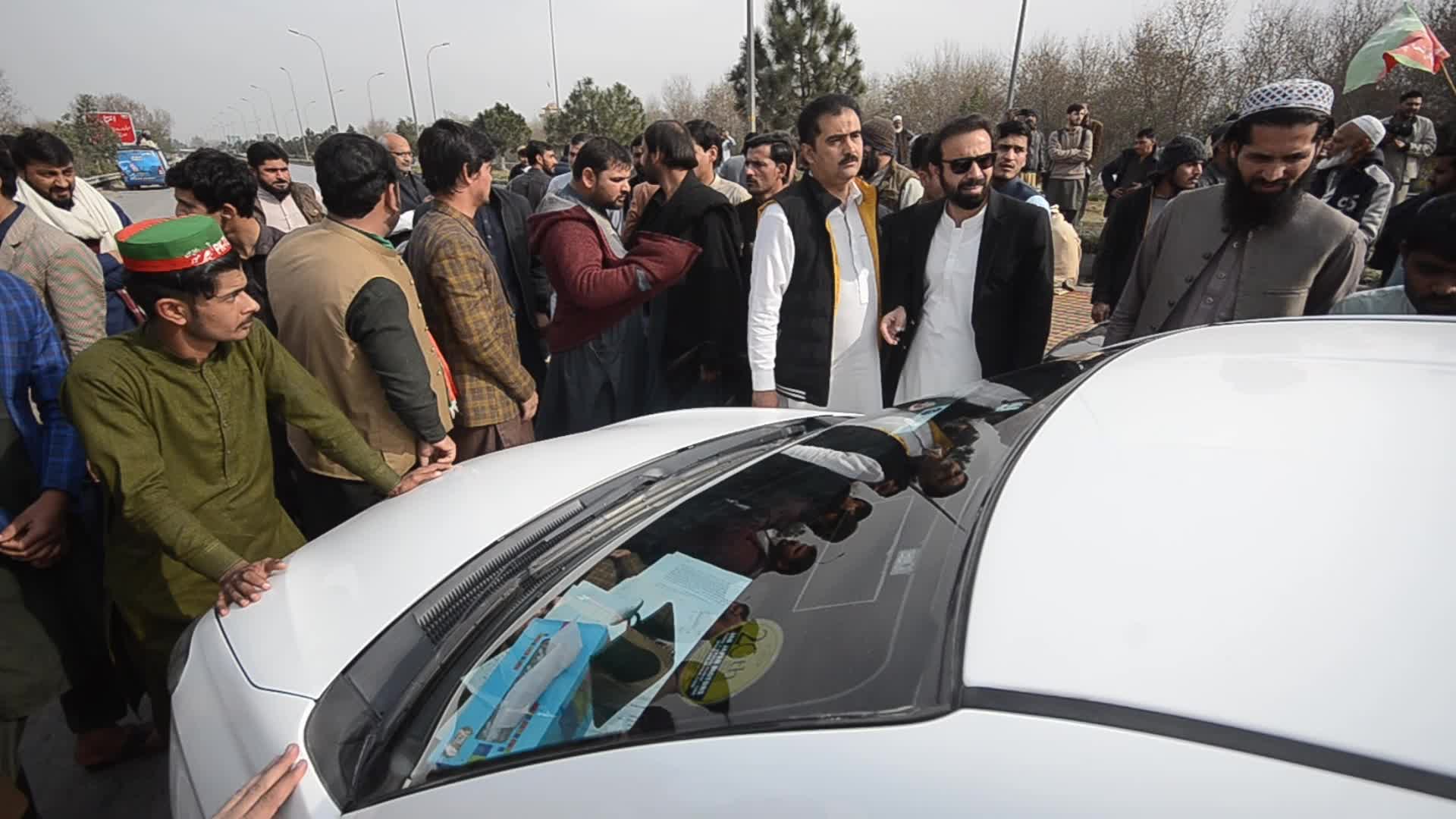 Supporters of PTI party protest against alleged rigging in general elections in Peshawar