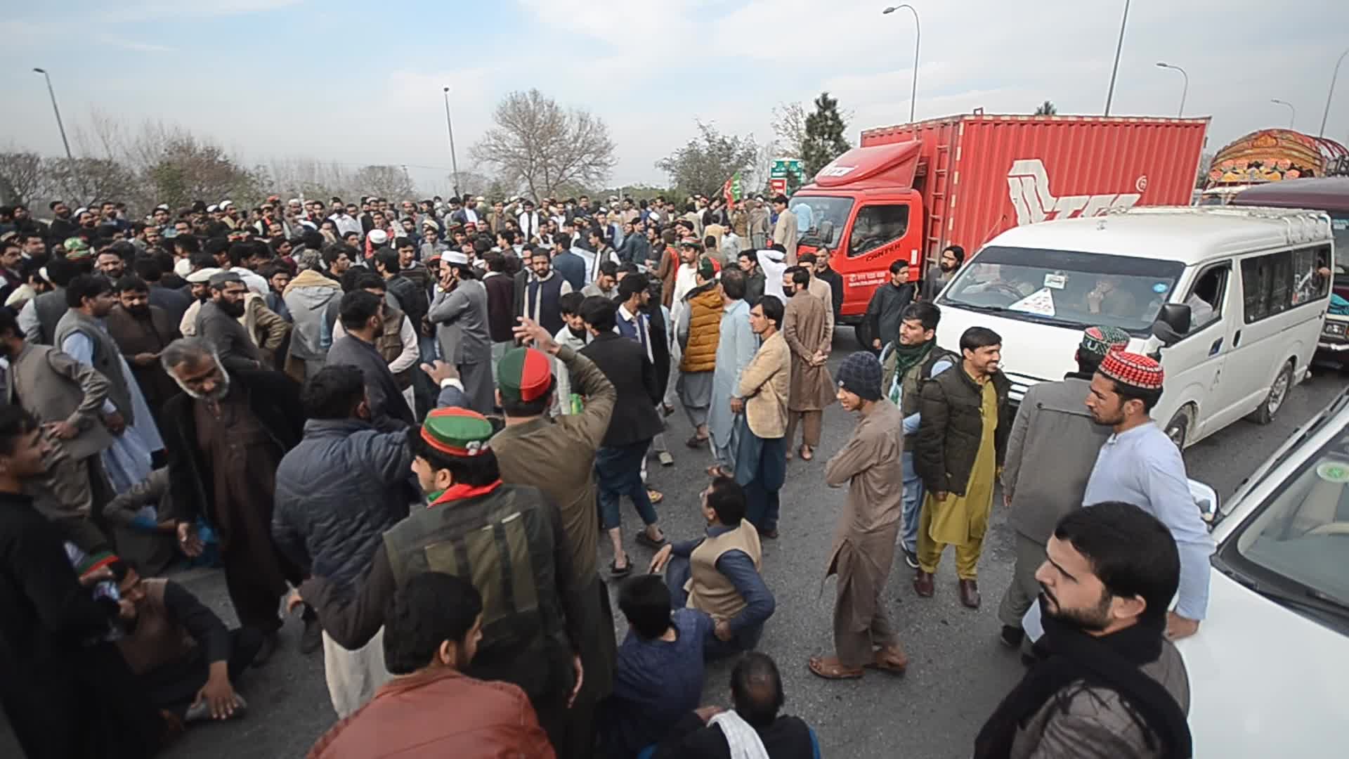 Supporters of PTI party protest against alleged rigging in general elections in Peshawar