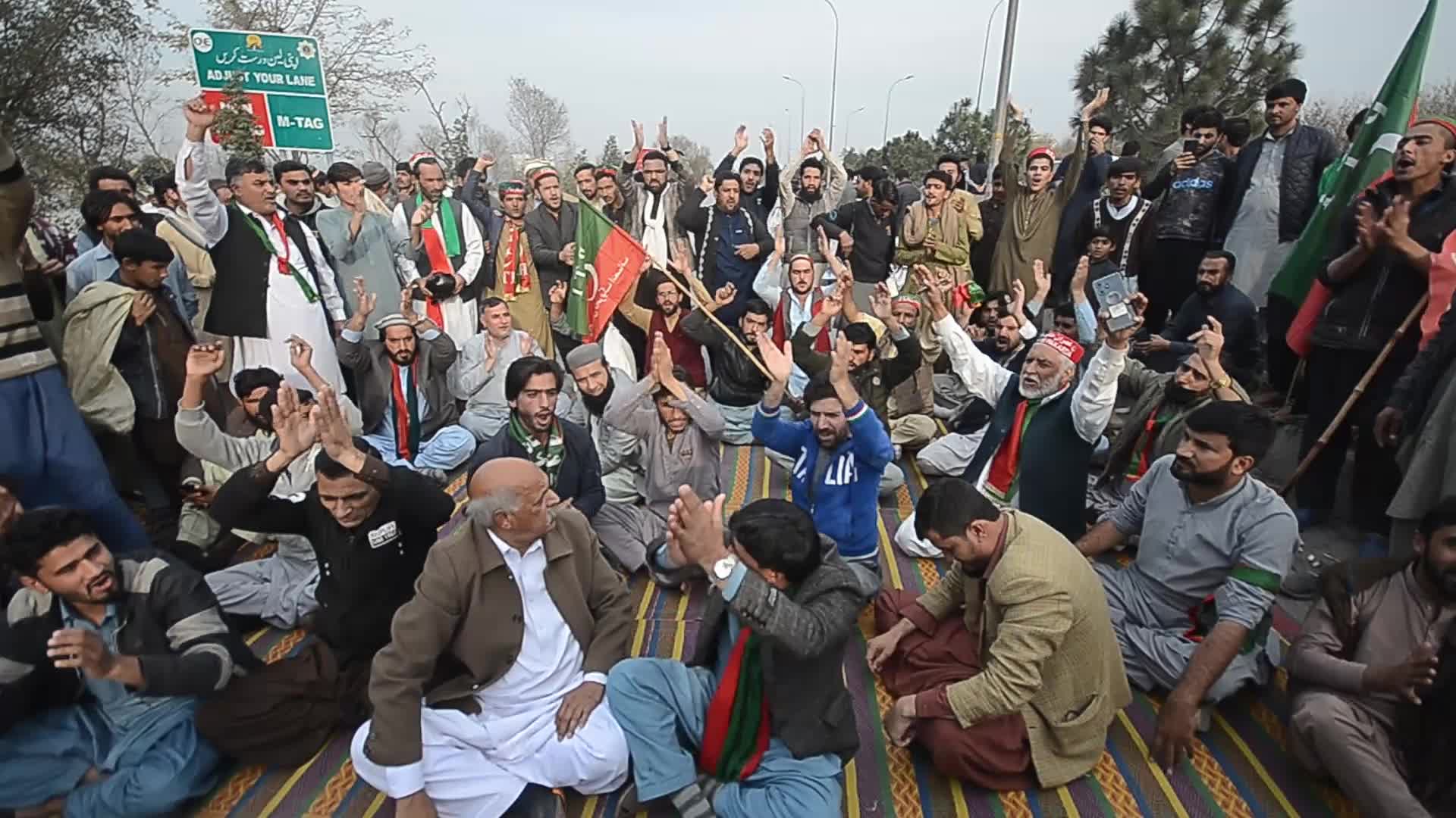 Supporters of PTI party protest against alleged rigging in general elections in Peshawar