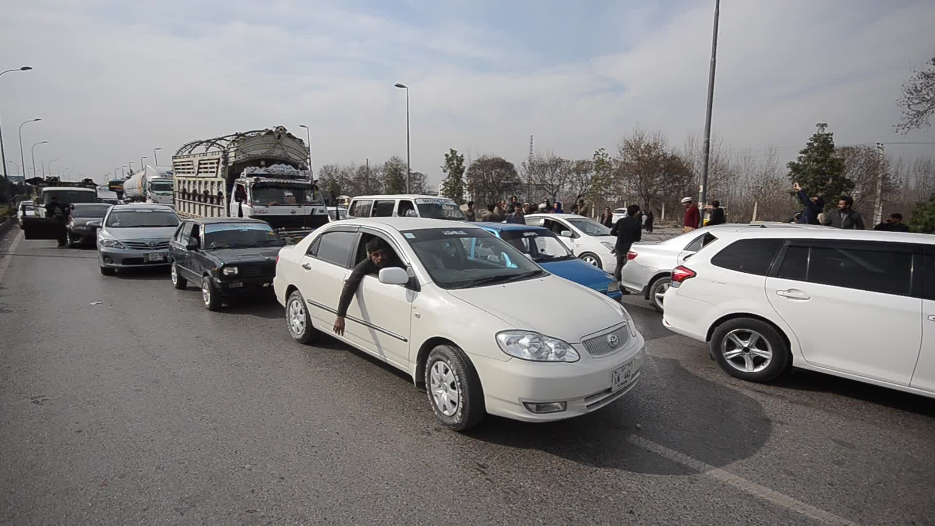 Supporters of PTI party protest against alleged rigging in general elections in Peshawar