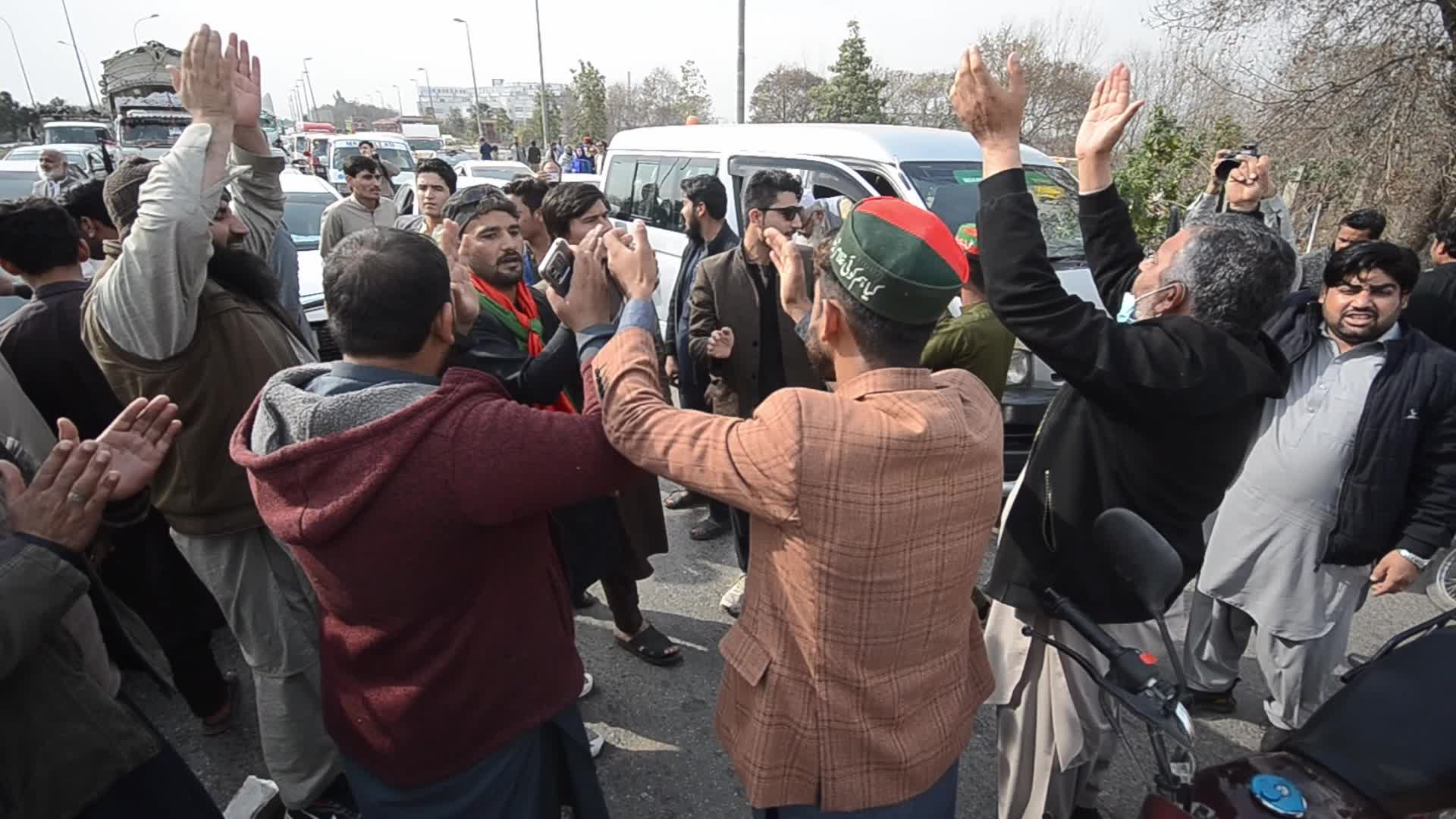 Supporters of PTI party protest against alleged rigging in general elections in Peshawar