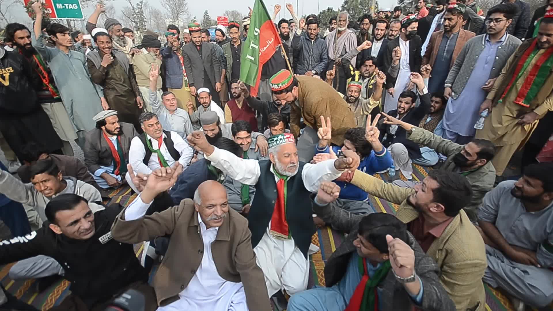 Supporters of PTI party protest against alleged rigging in general elections in Peshawar