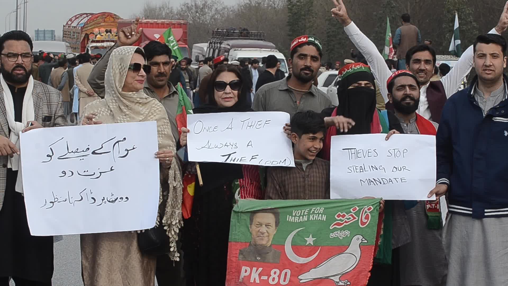 Supporters of PTI party protest against alleged rigging in general elections in Peshawar