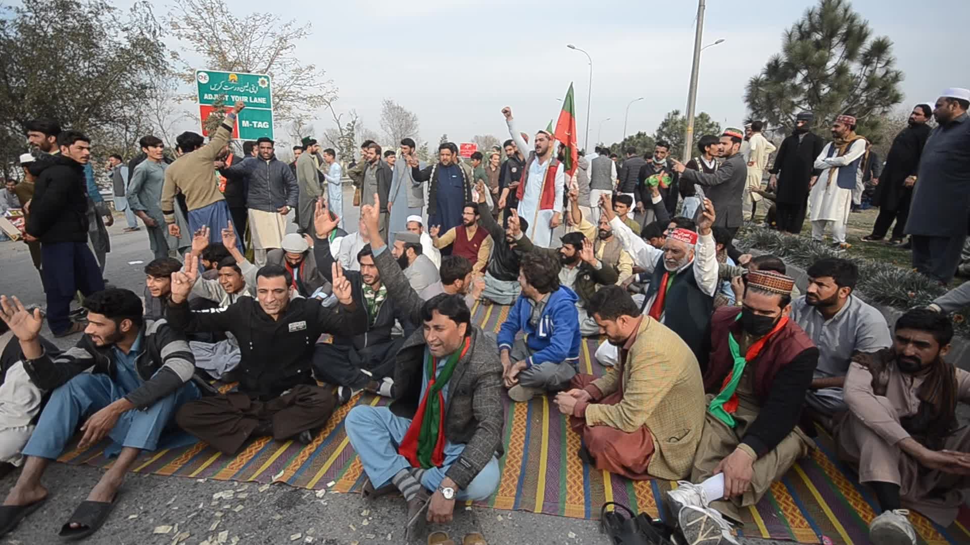 Supporters of PTI party protest against alleged rigging in general elections in Peshawar