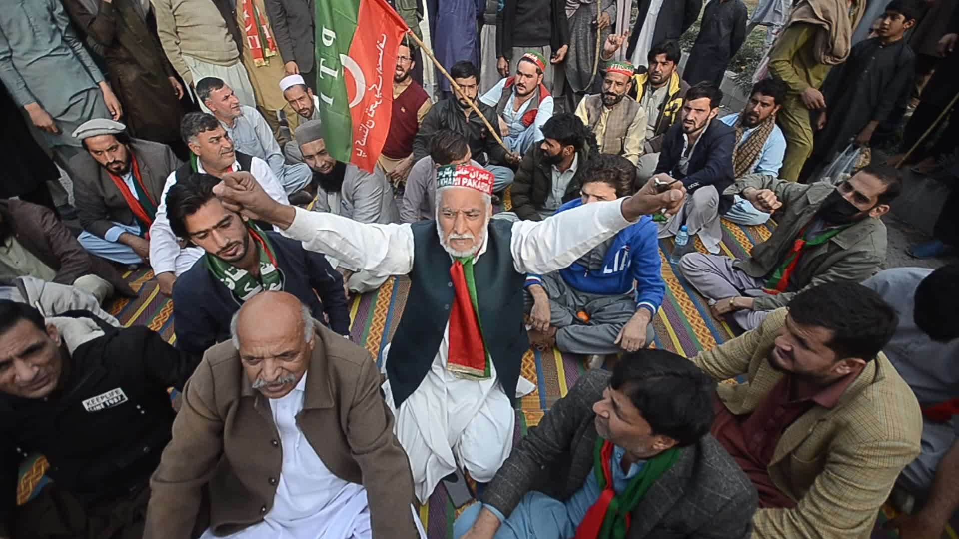 Supporters of PTI party protest against alleged rigging in general elections in Peshawar