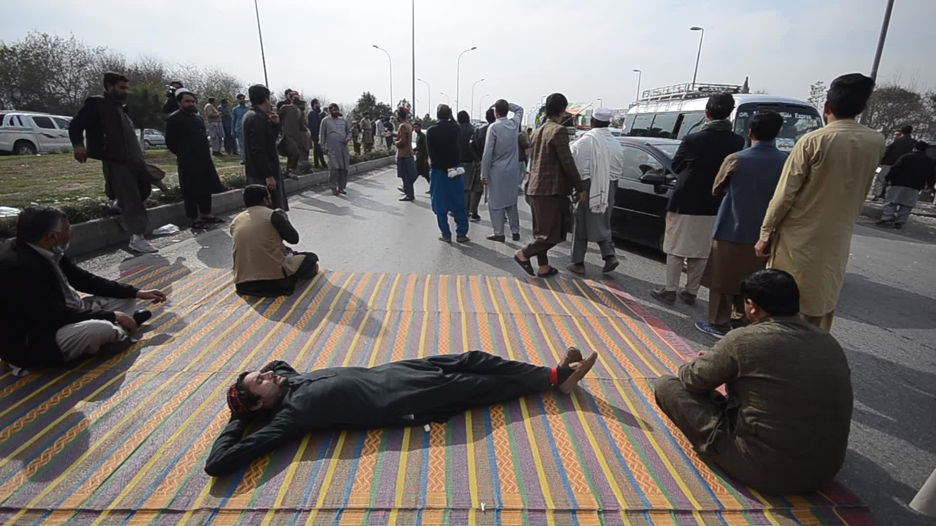 Supporters of PTI party protest against alleged rigging in general elections in Peshawar