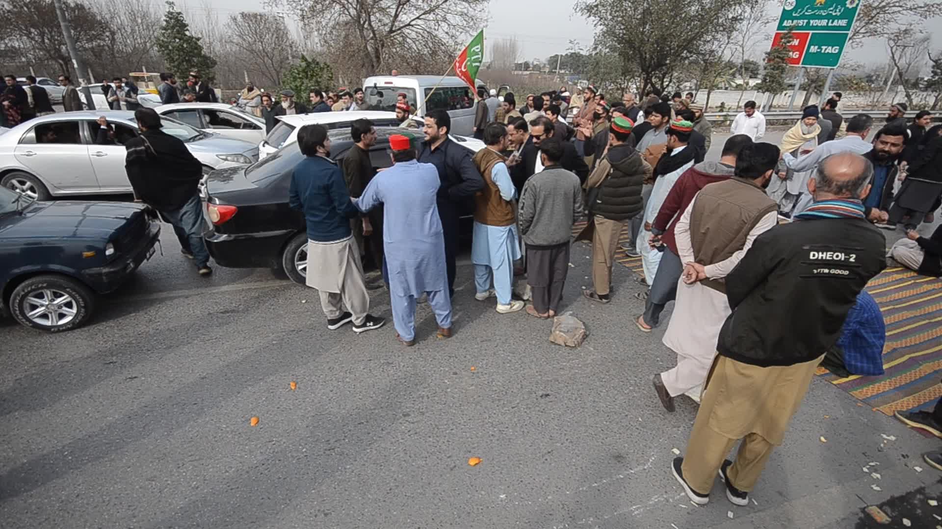 Supporters of PTI party protest against alleged rigging in general elections in Peshawar