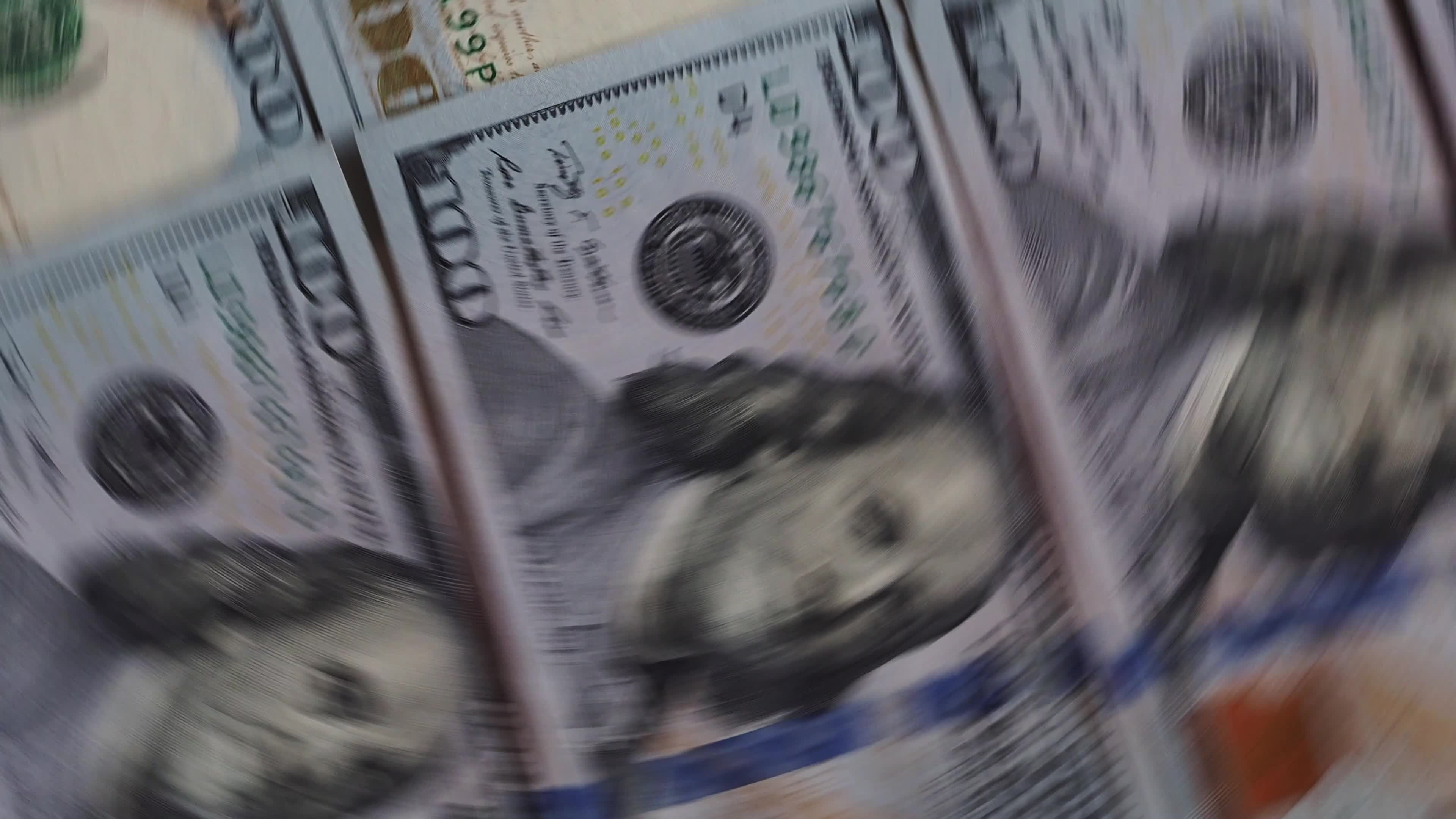 Background of rotating  100 dollars bills
