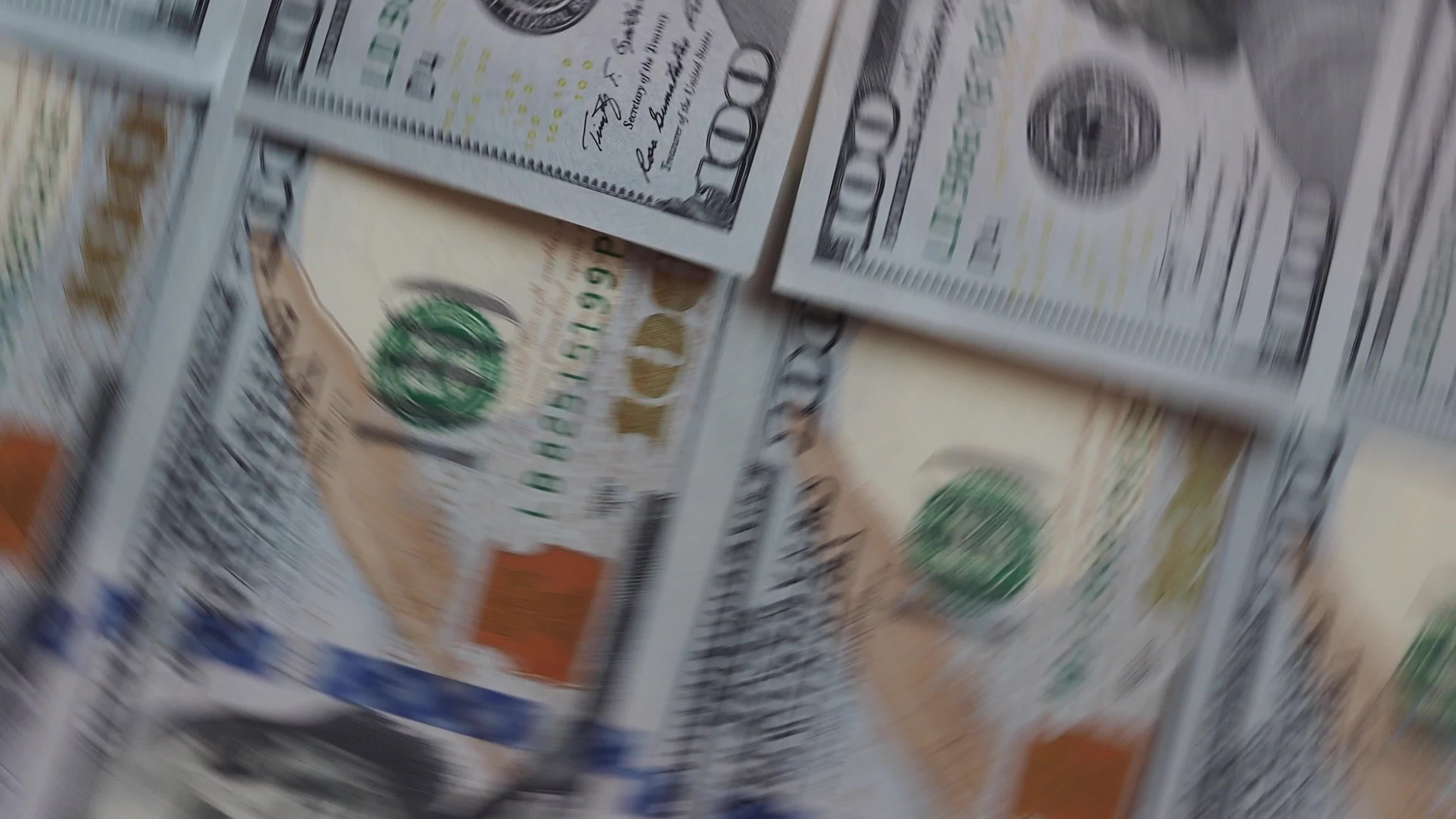 Background of rotating  100 dollars bills