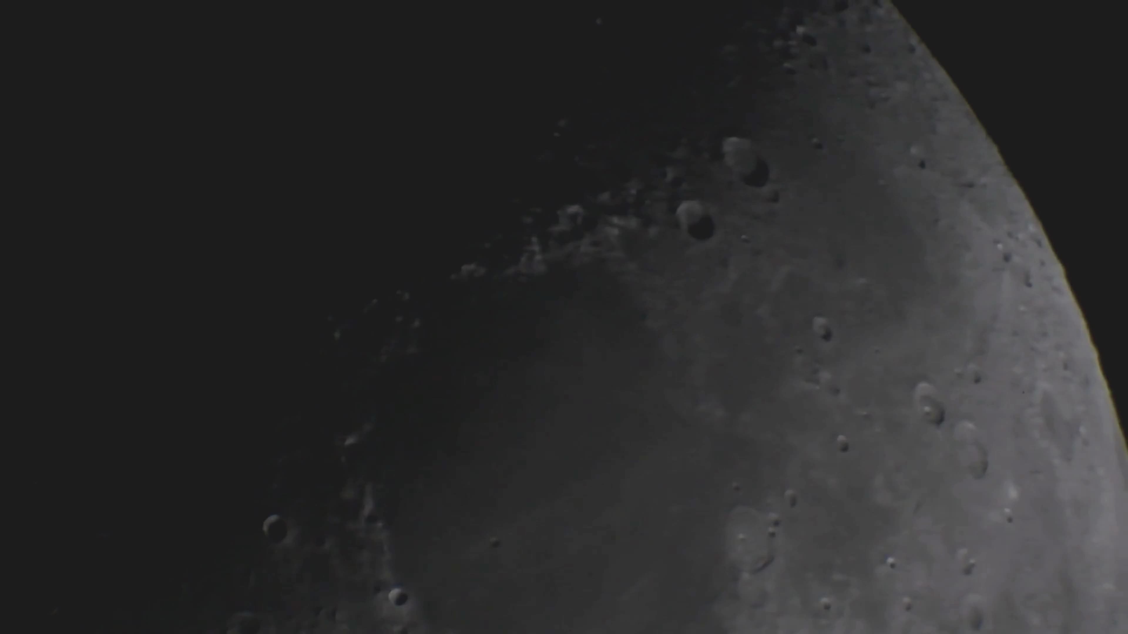 Moon In First Quarter Through A Telescope