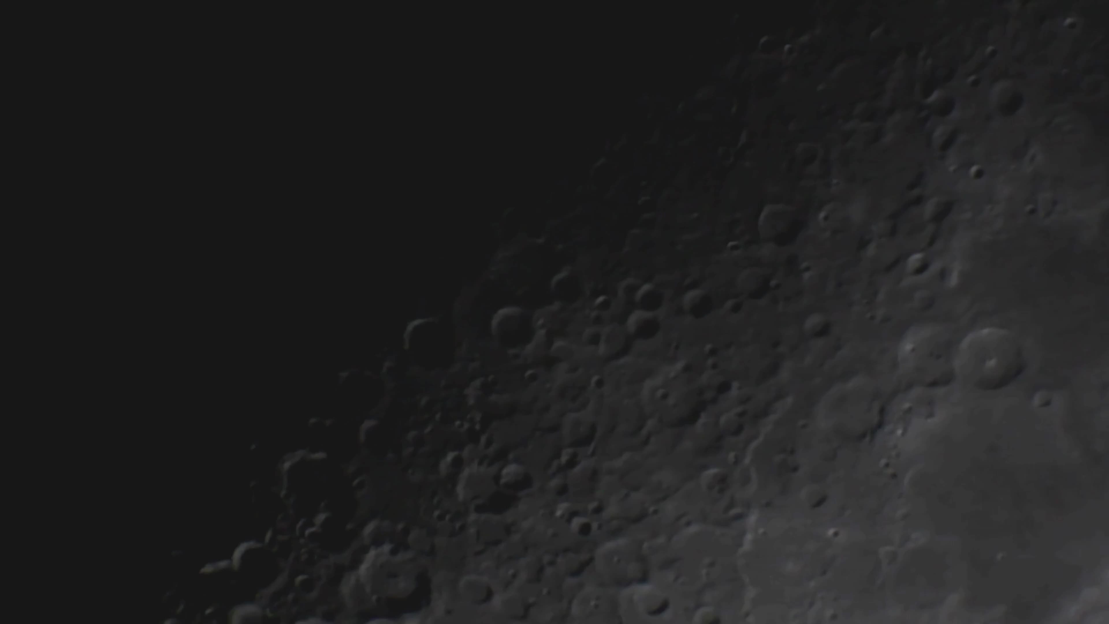 Moon In First Quarter Through A Telescope