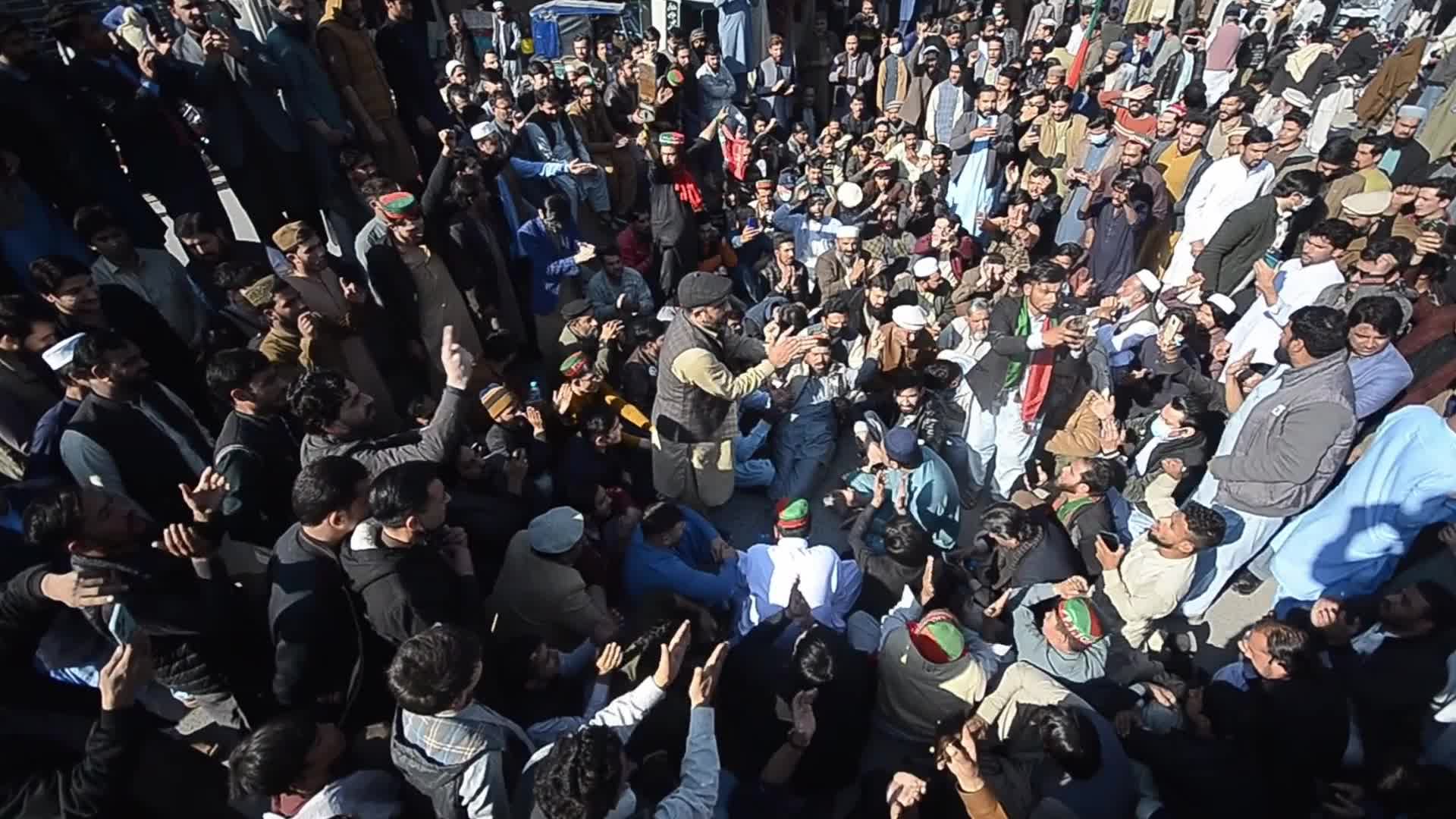 Supporters of Imran Khan's PTI party protest against alleged rigging in general elections in Peshawar 