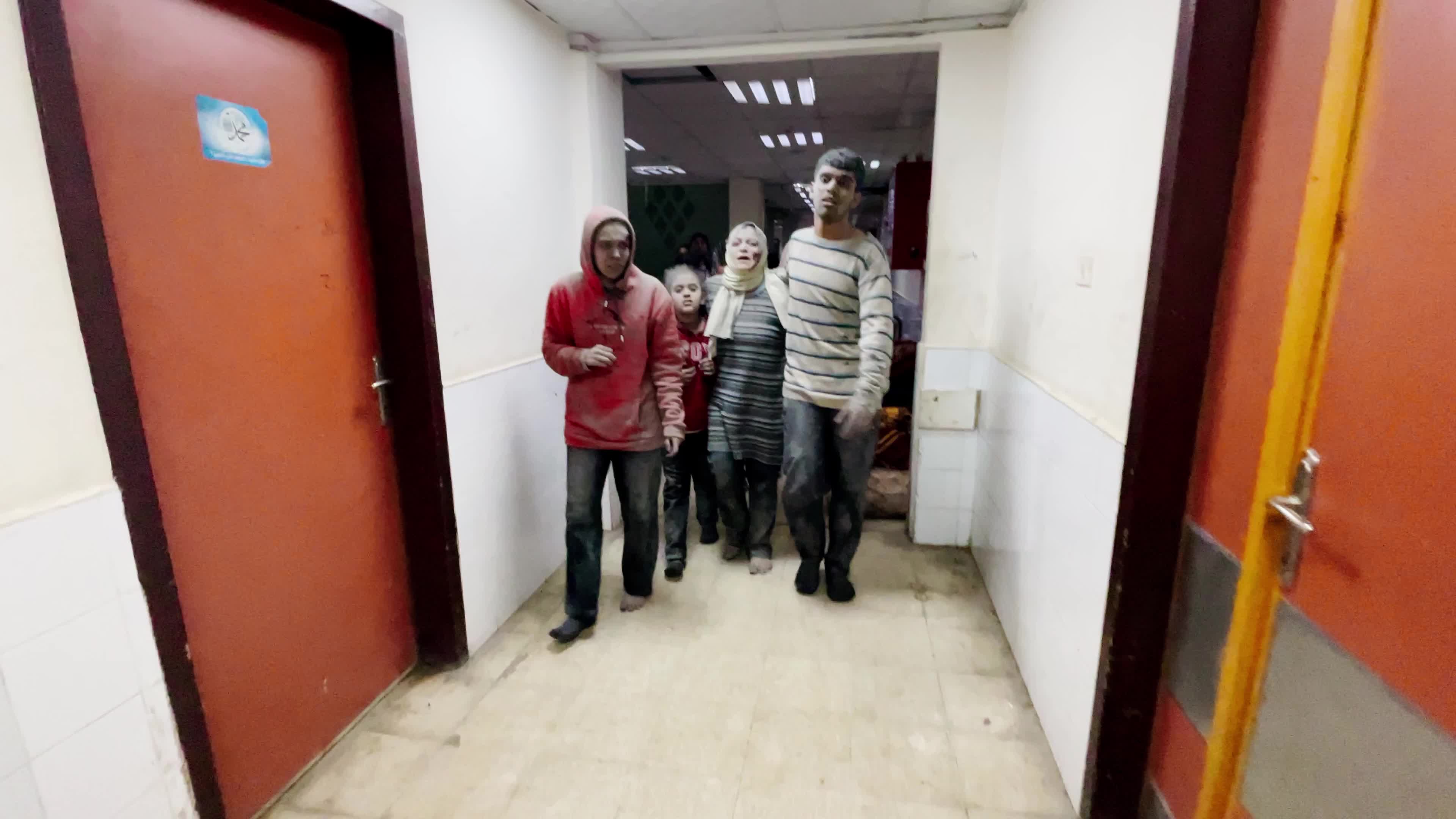 Palestinians Rush Injured to Hospital Amid Ongoing Conflict with Hamas