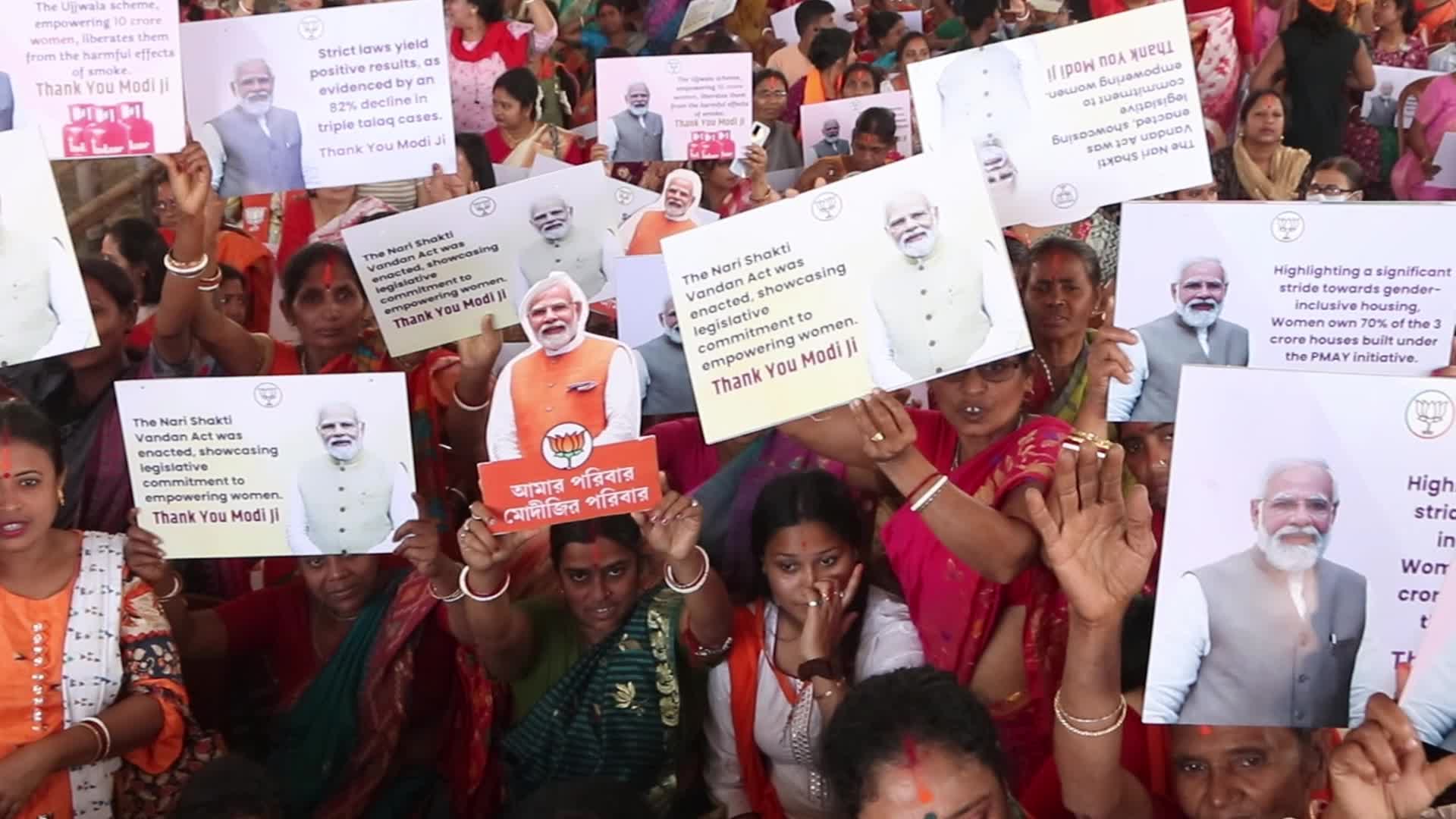 BJP Supporter Holds Narendra Modi Cutout at Public Meeting in Barasat, Kolkata