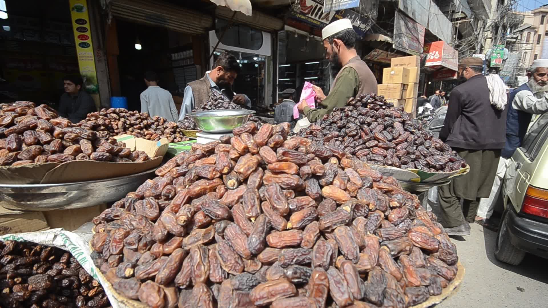 People shop ahead of Muslims' holy month of Ramdan in Pakistan