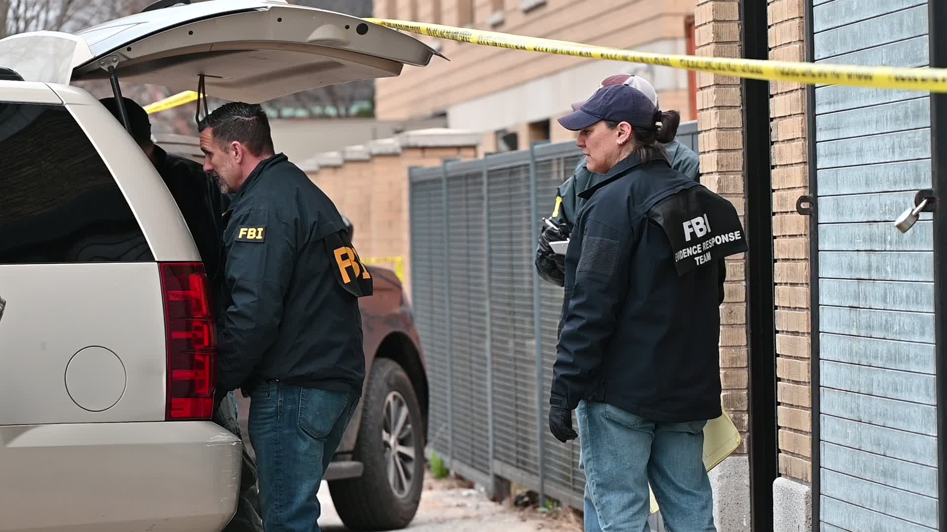 FBI Agents Collect Evidence At A Warehouse Following A Double Homicide In Mount Vernon New York