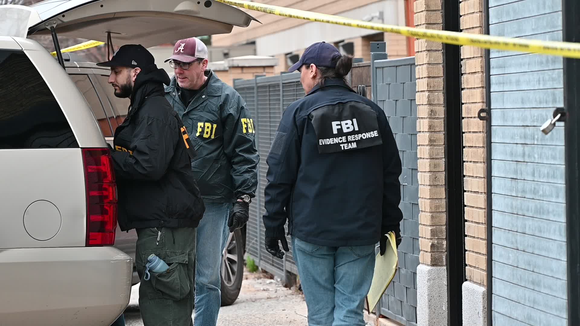 FBI Agents Collect Evidence At A Warehouse Following A Double Homicide In Mount Vernon New York