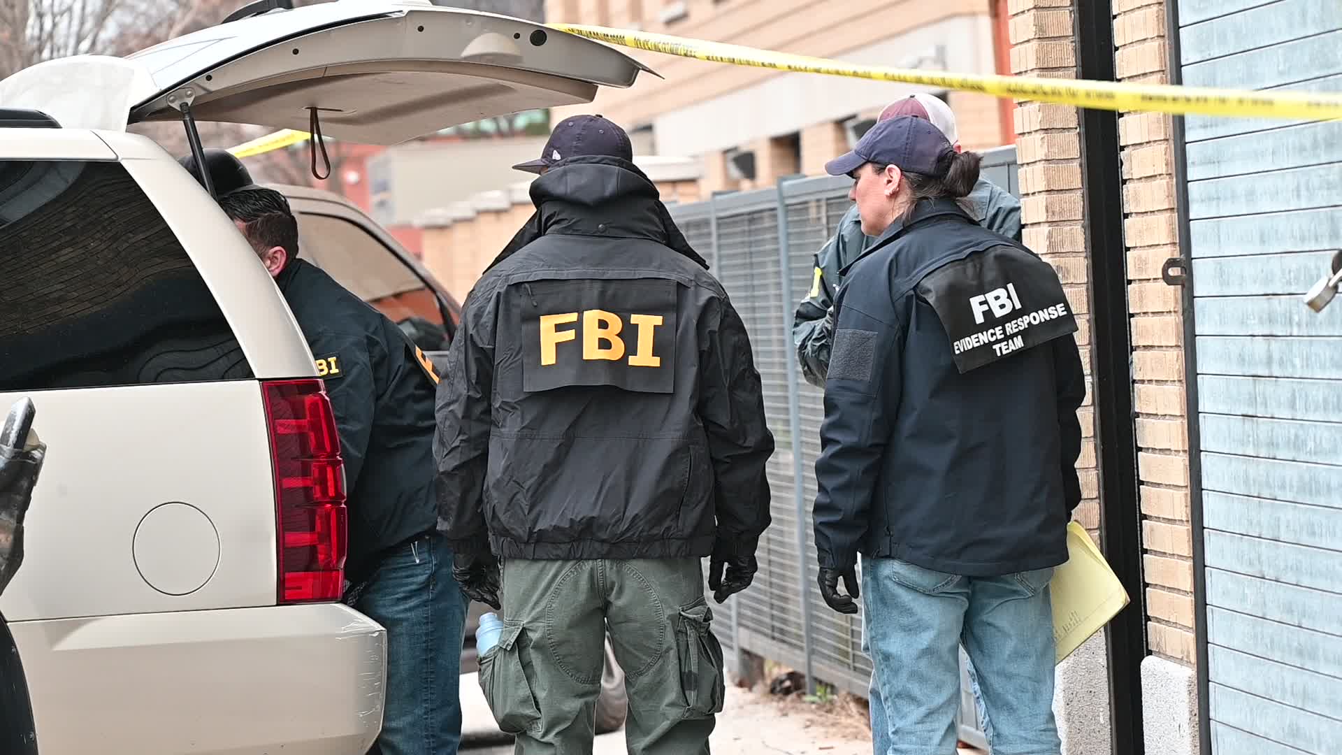 FBI Agents Collect Evidence At A Warehouse Following A Double Homicide In Mount Vernon New York