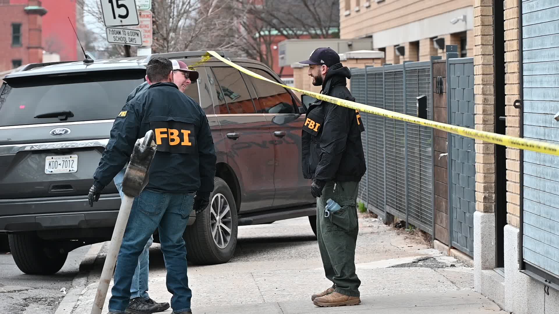 FBI Agents Collect Evidence At A Warehouse Following A Double Homicide In Mount Vernon New York