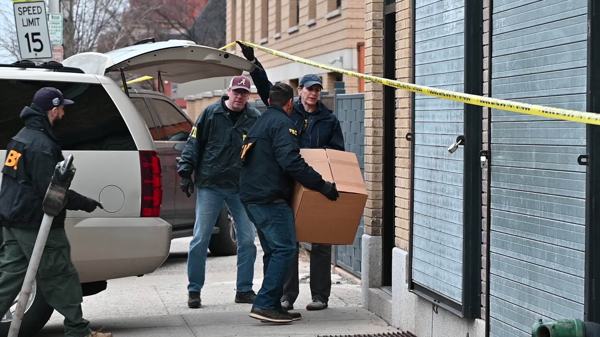 FBI Agents Collect Evidence At A Warehouse Following A Double Homicide In Mount Vernon New York
