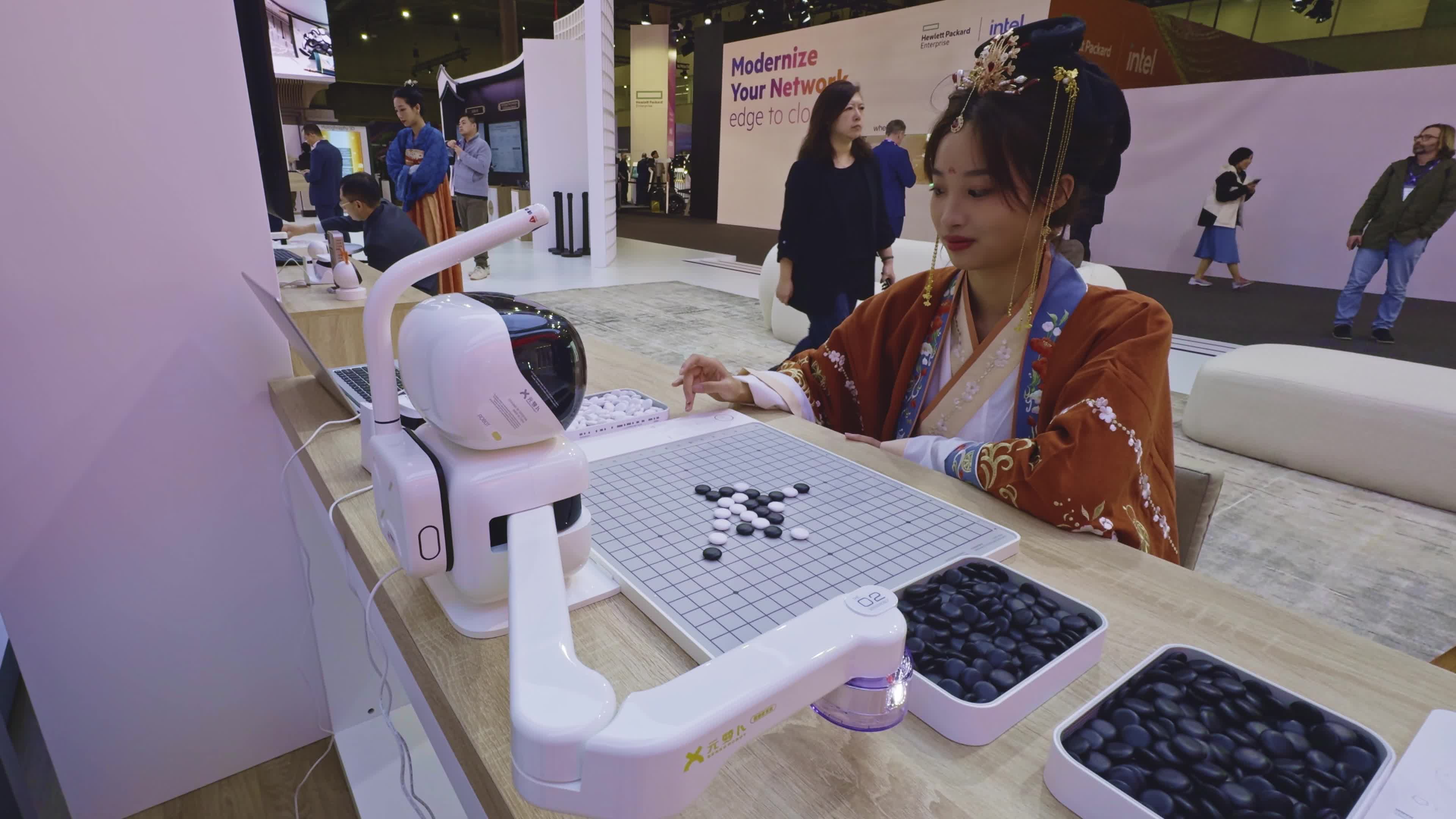 Robot playing games with a woman