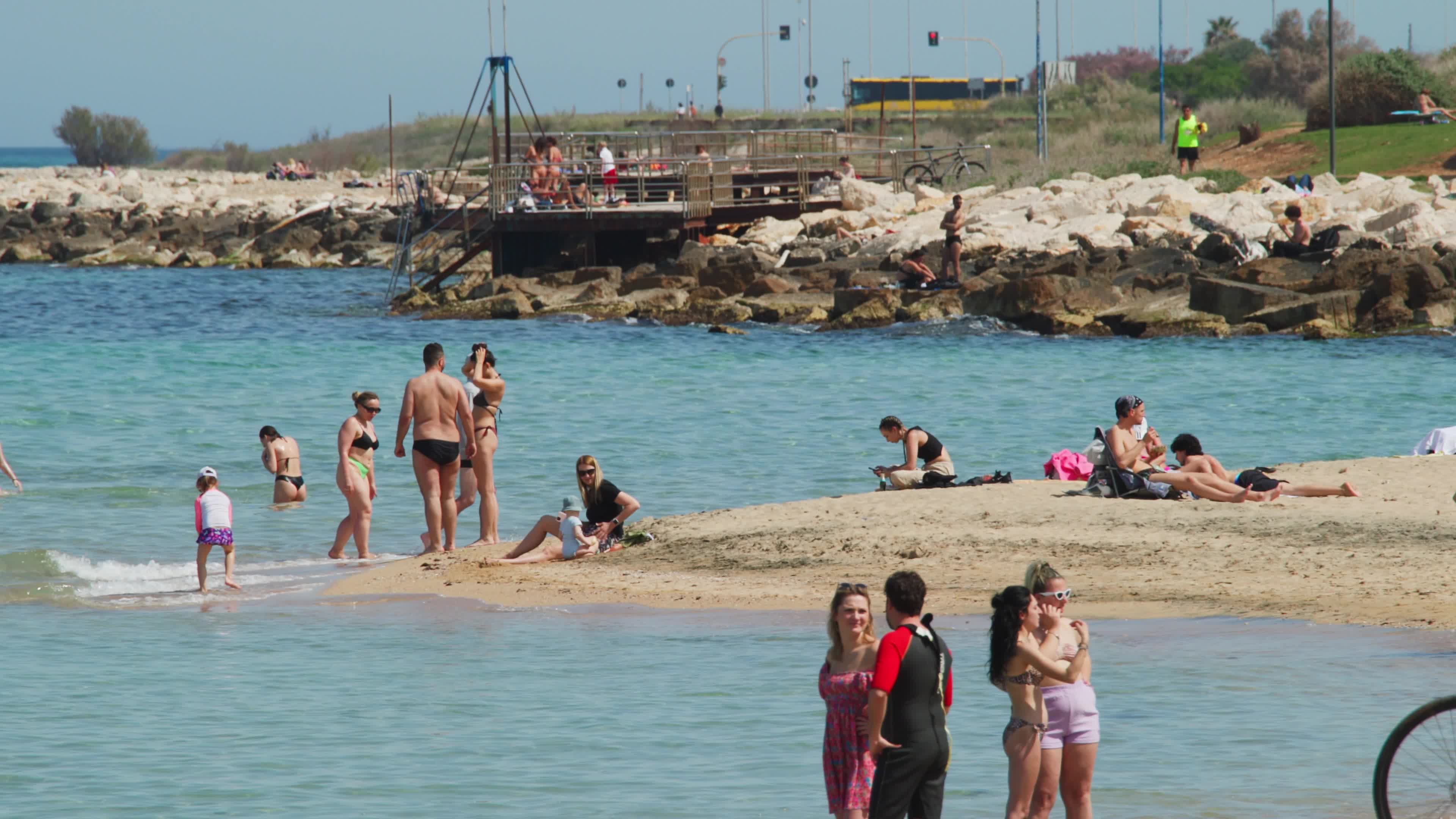 People at the Beach in Italy Amid Above-Normal Temperatures in April
