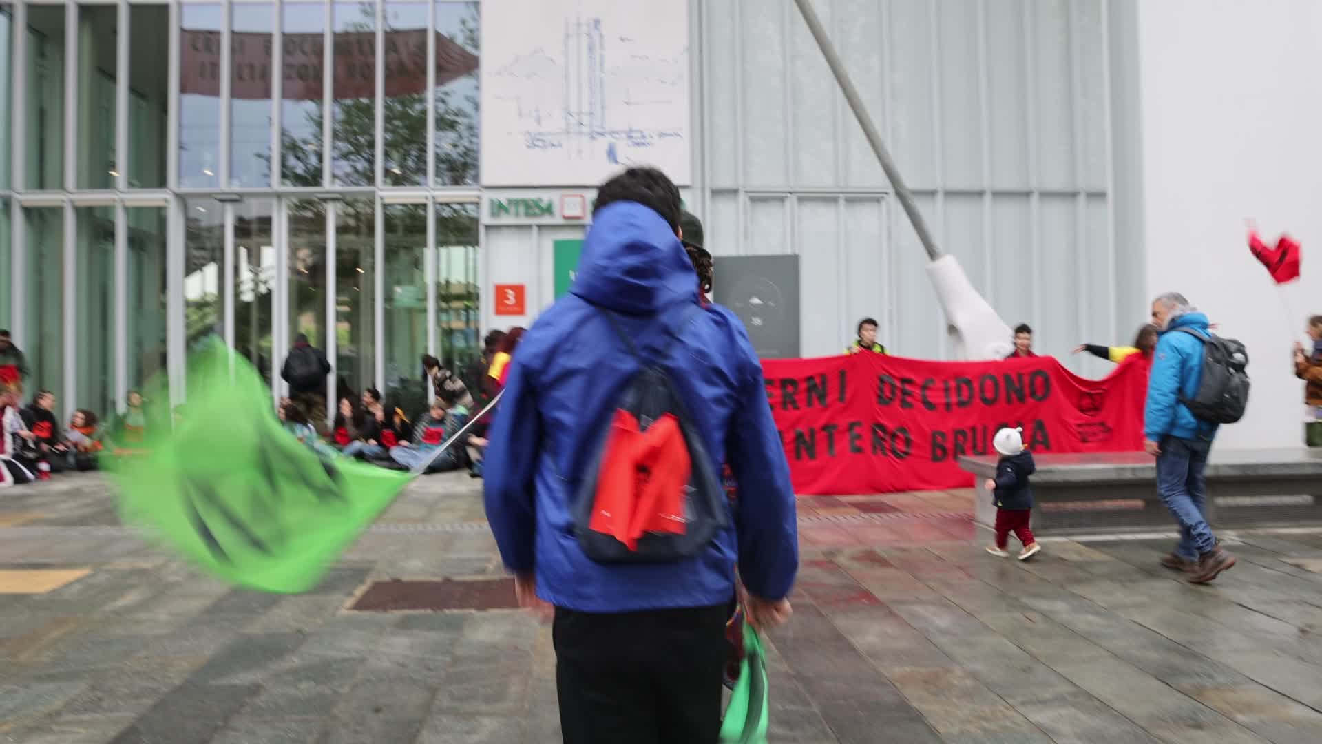 Activists from Extinction Rebellion (XR) protested at the Intesa Sanpaolo skyscraper
