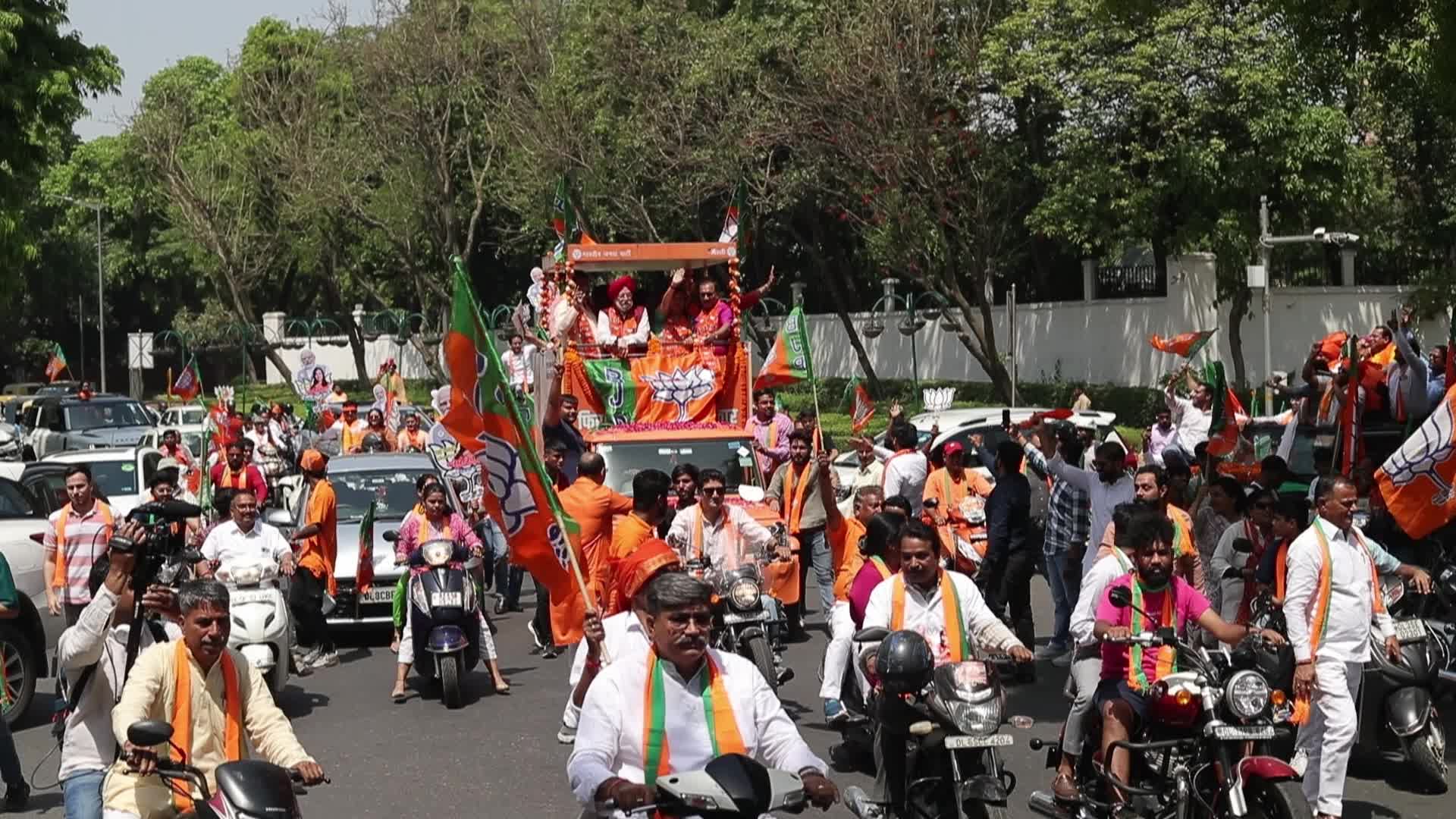 BJP Supporters Rally with Flags in New Delhi Before General Elections