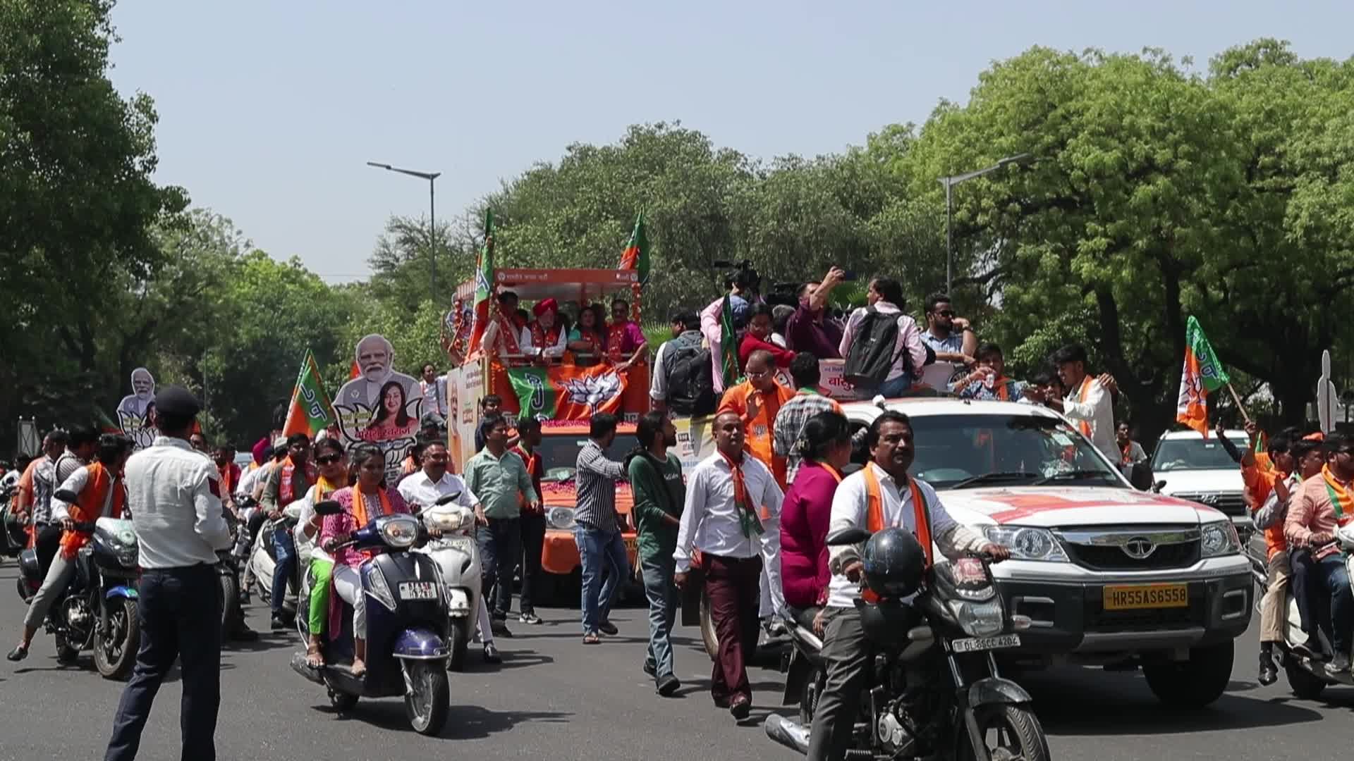 BJP Supporters Rally with Flags in New Delhi Before General Elections