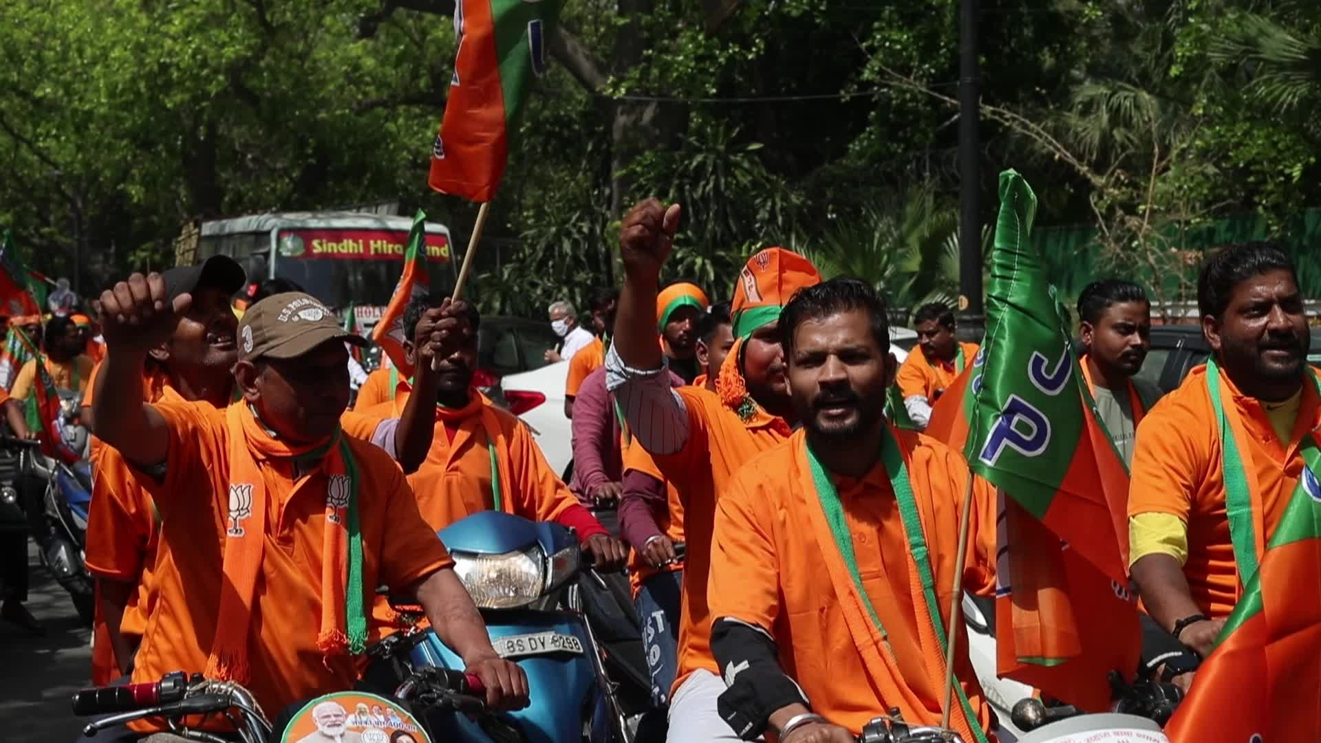 BJP Supporters Rally with Flags in New Delhi Before General Elections