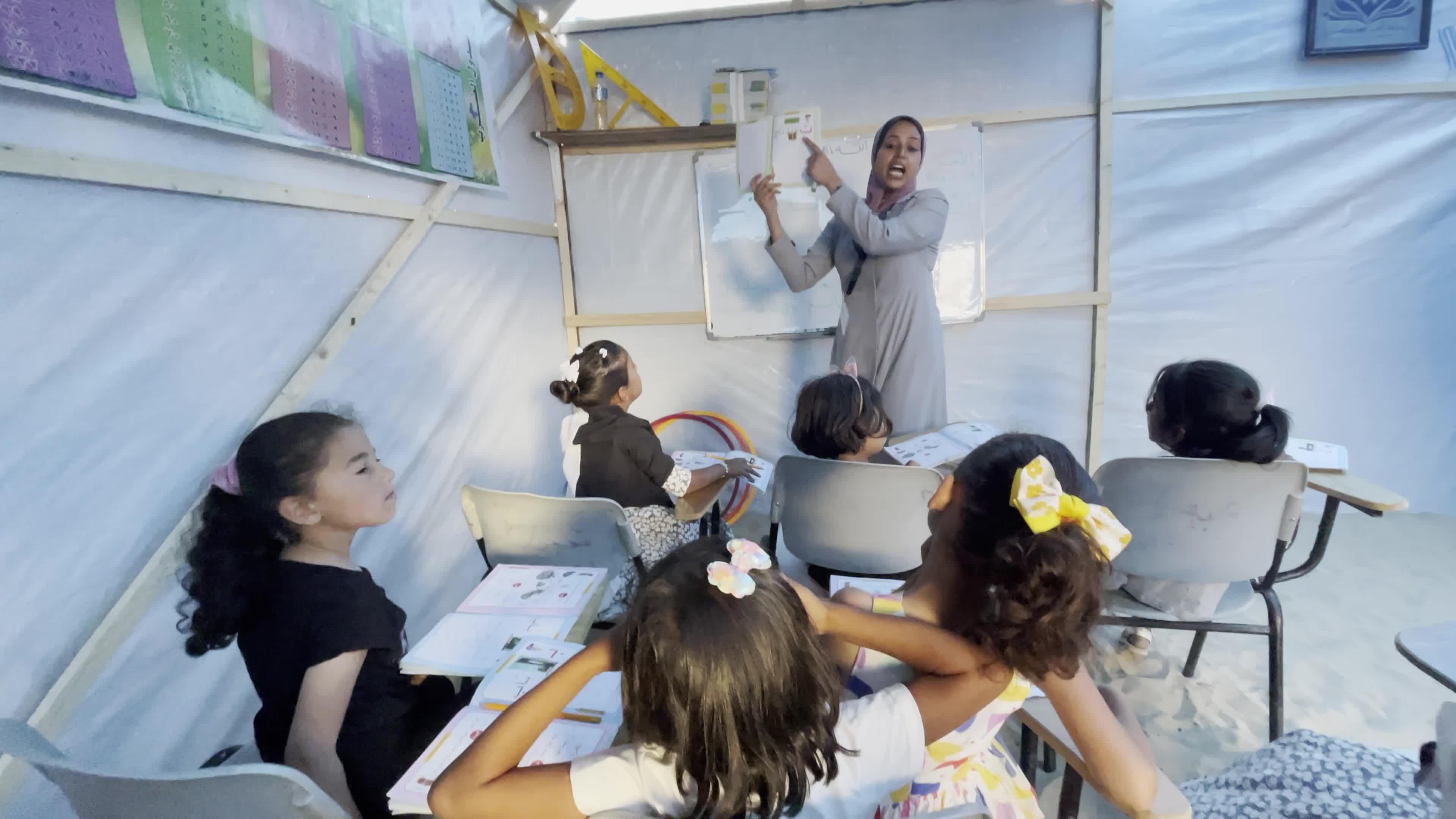 Palestinian Children Attend School in Displacement Camp Amid Hamas Israel Conflict