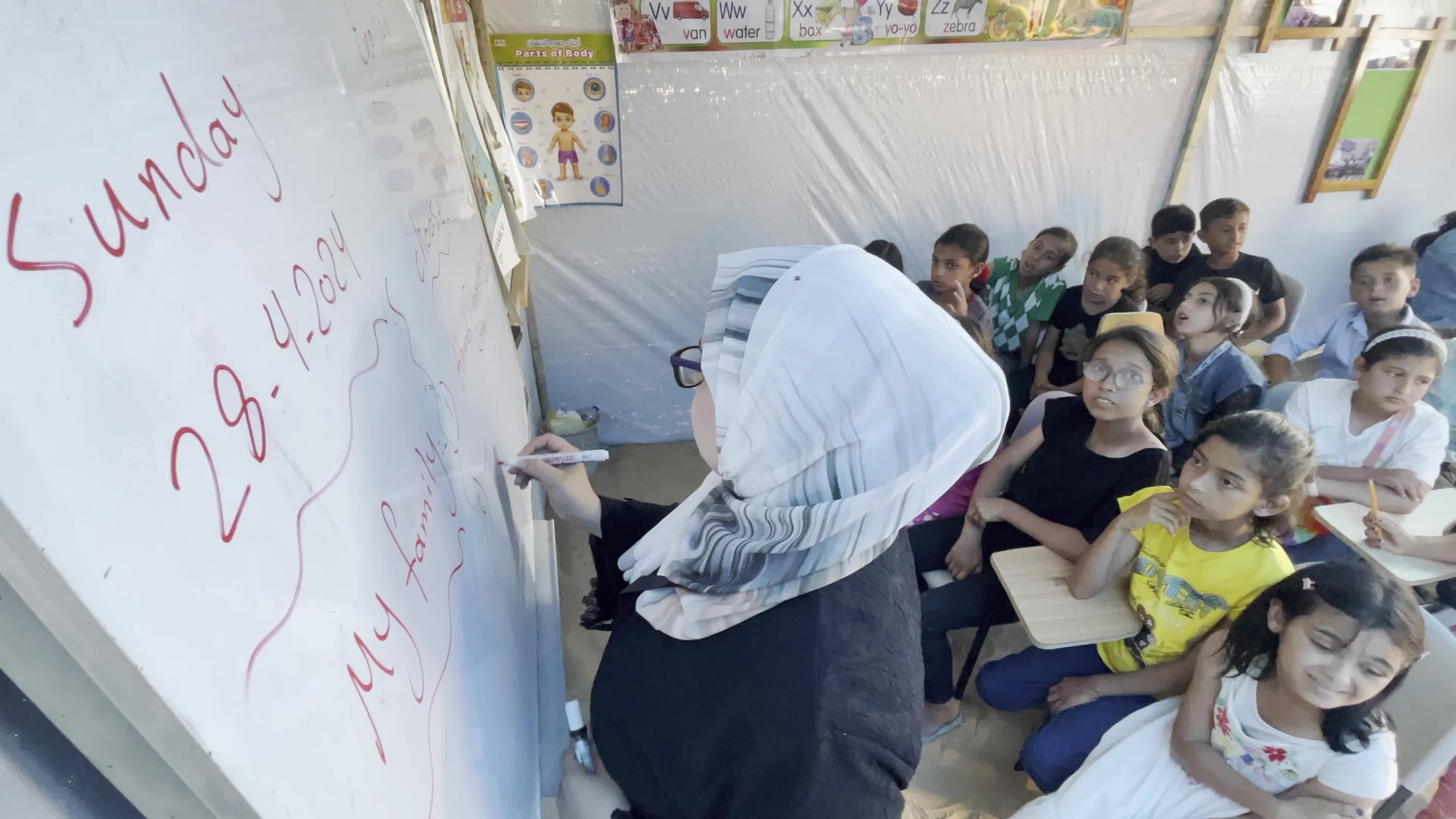 Palestinian Children Attend School in Displacement Camp Amid Hamas Israel Conflict