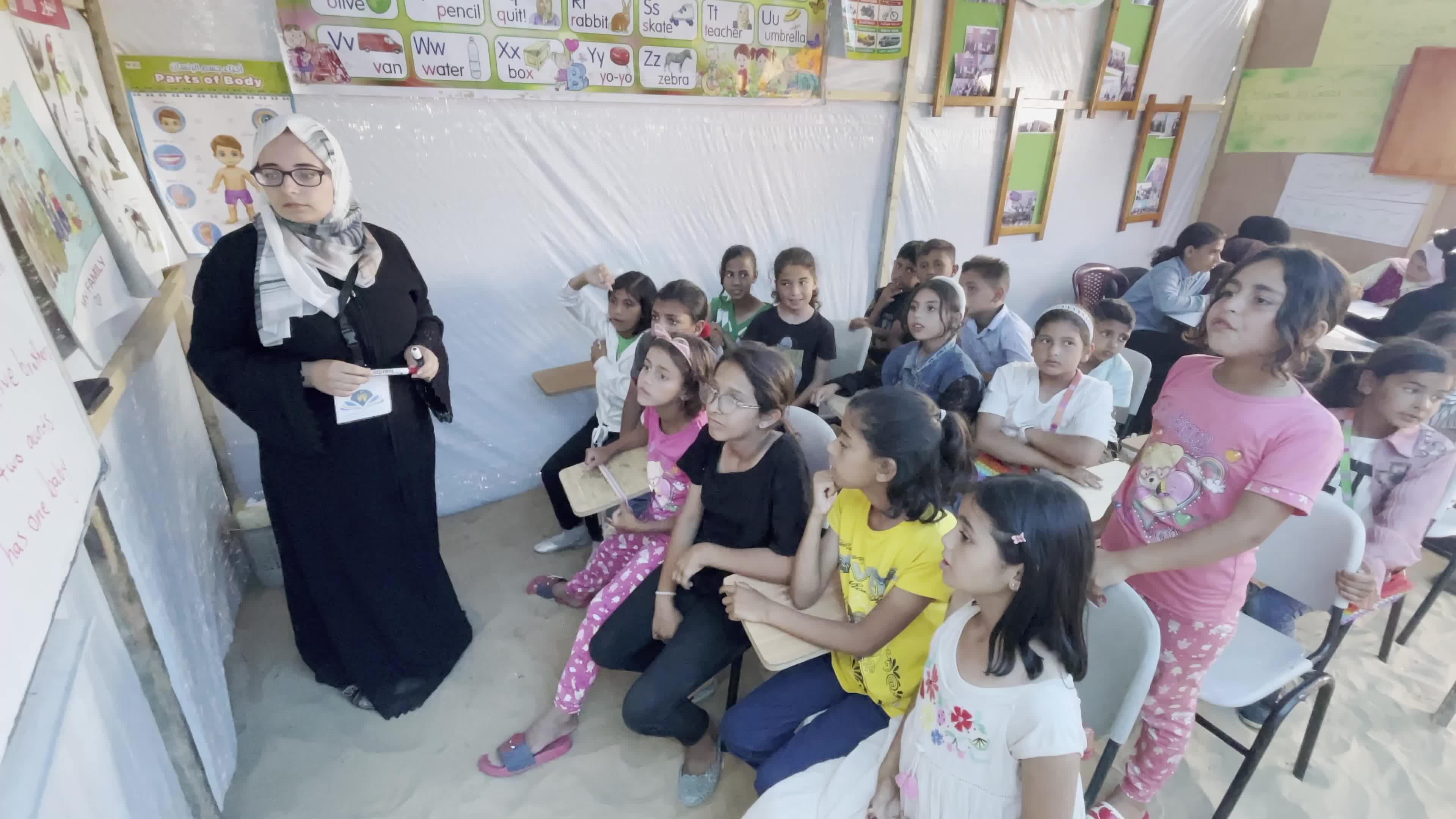Palestinian Children Attend School in Displacement Camp Amid Hamas Israel Conflict