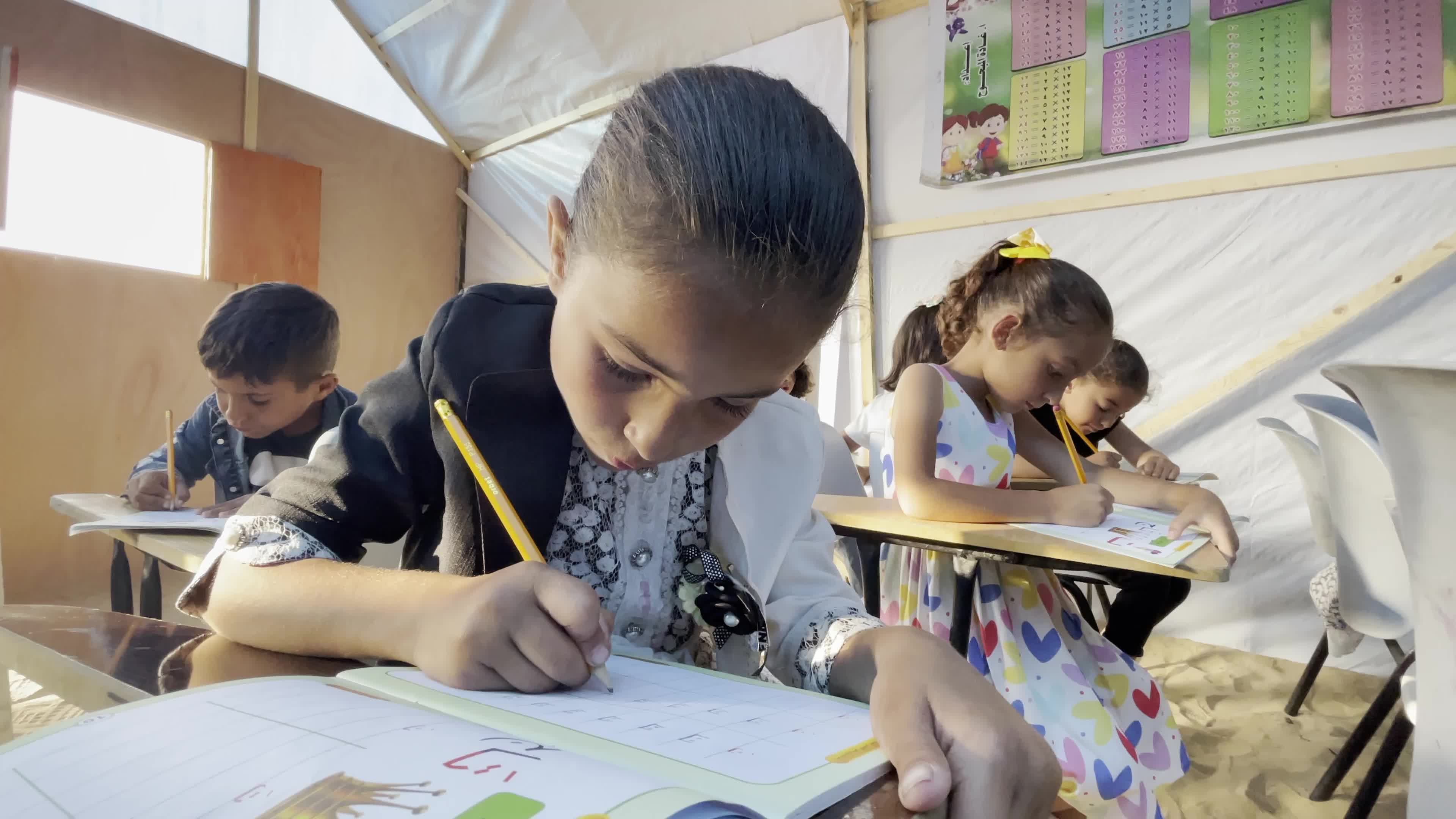 Palestinian Children Attend School in Displacement Camp Amid Hamas Israel Conflict