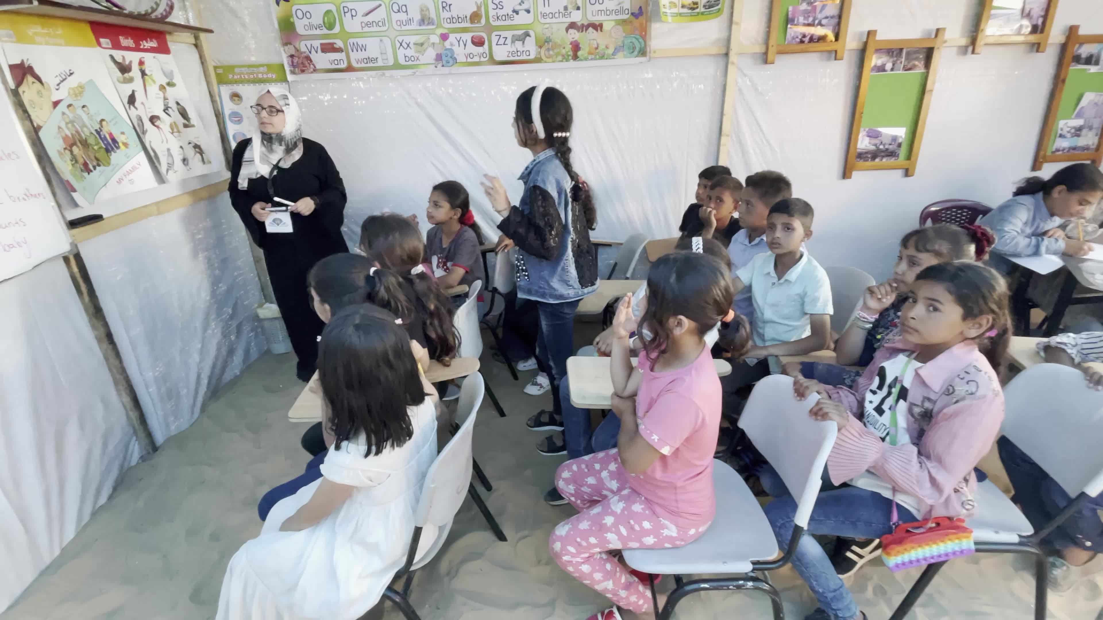 Palestinian Children Attend School in Displacement Camp Amid Hamas Israel Conflict