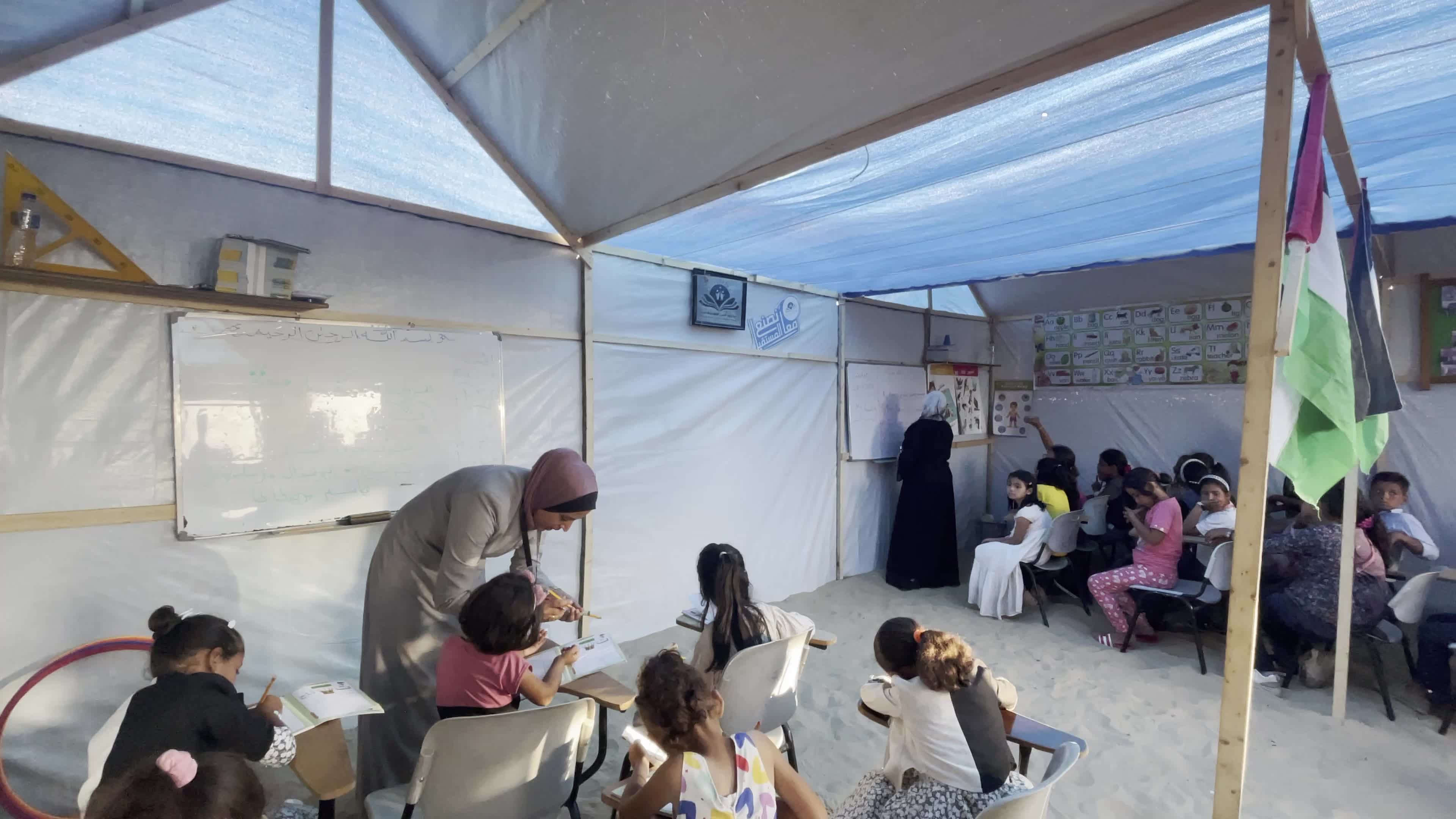 Palestinian Children Attend School in Displacement Camp Amid Hamas Israel Conflict
