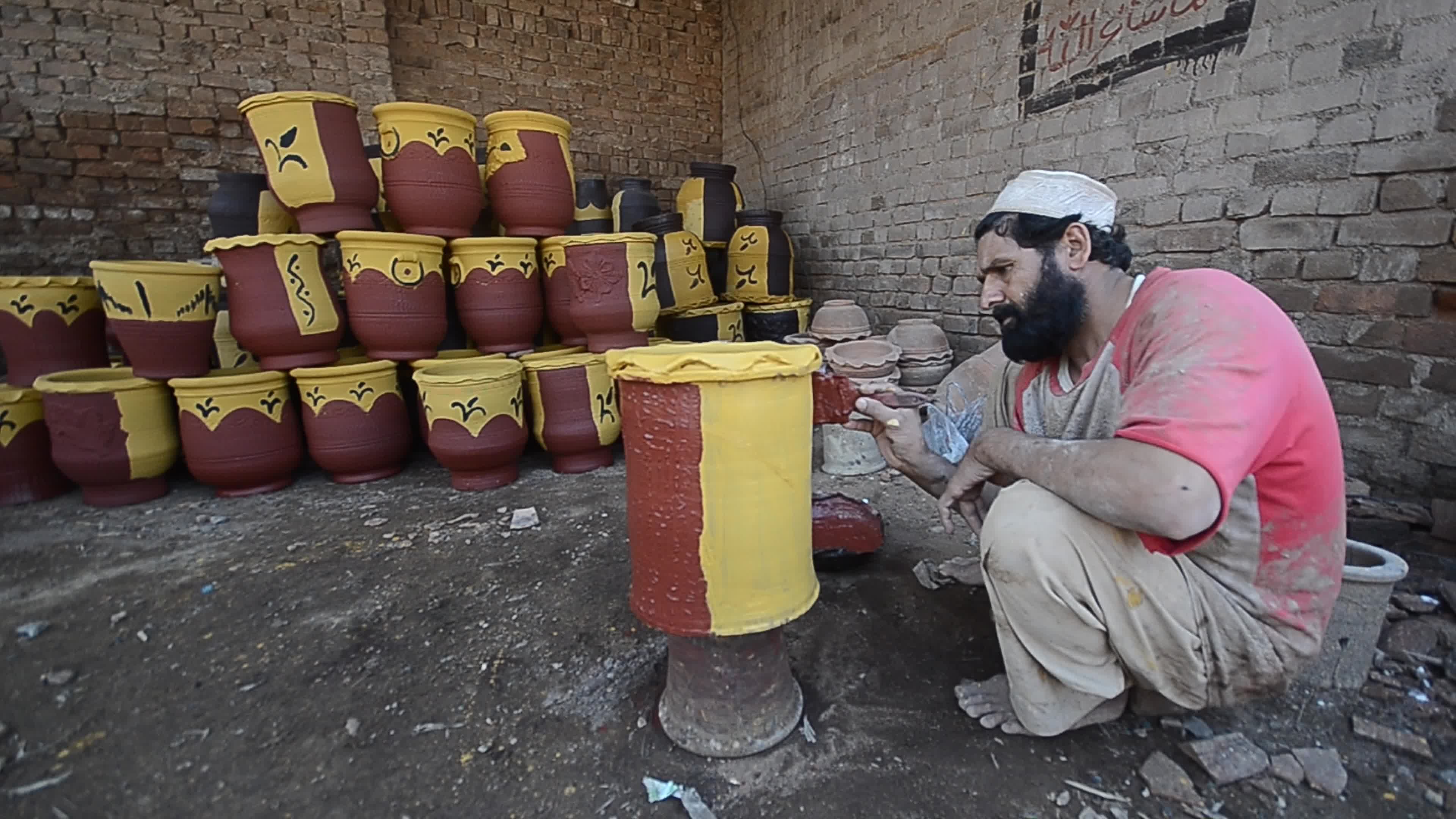 Laborers work on the eve of World Labor Day in Peshawar 