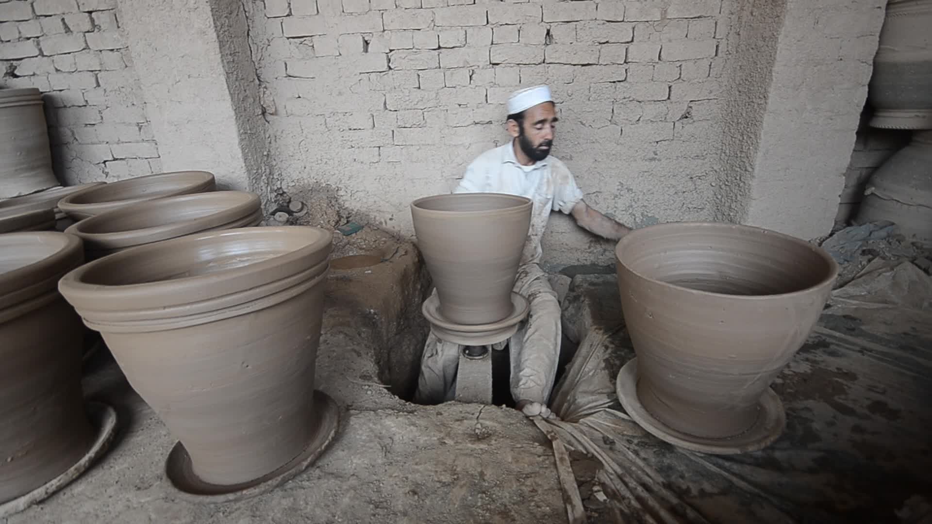 Laborers work on the eve of World Labor Day in Peshawar 