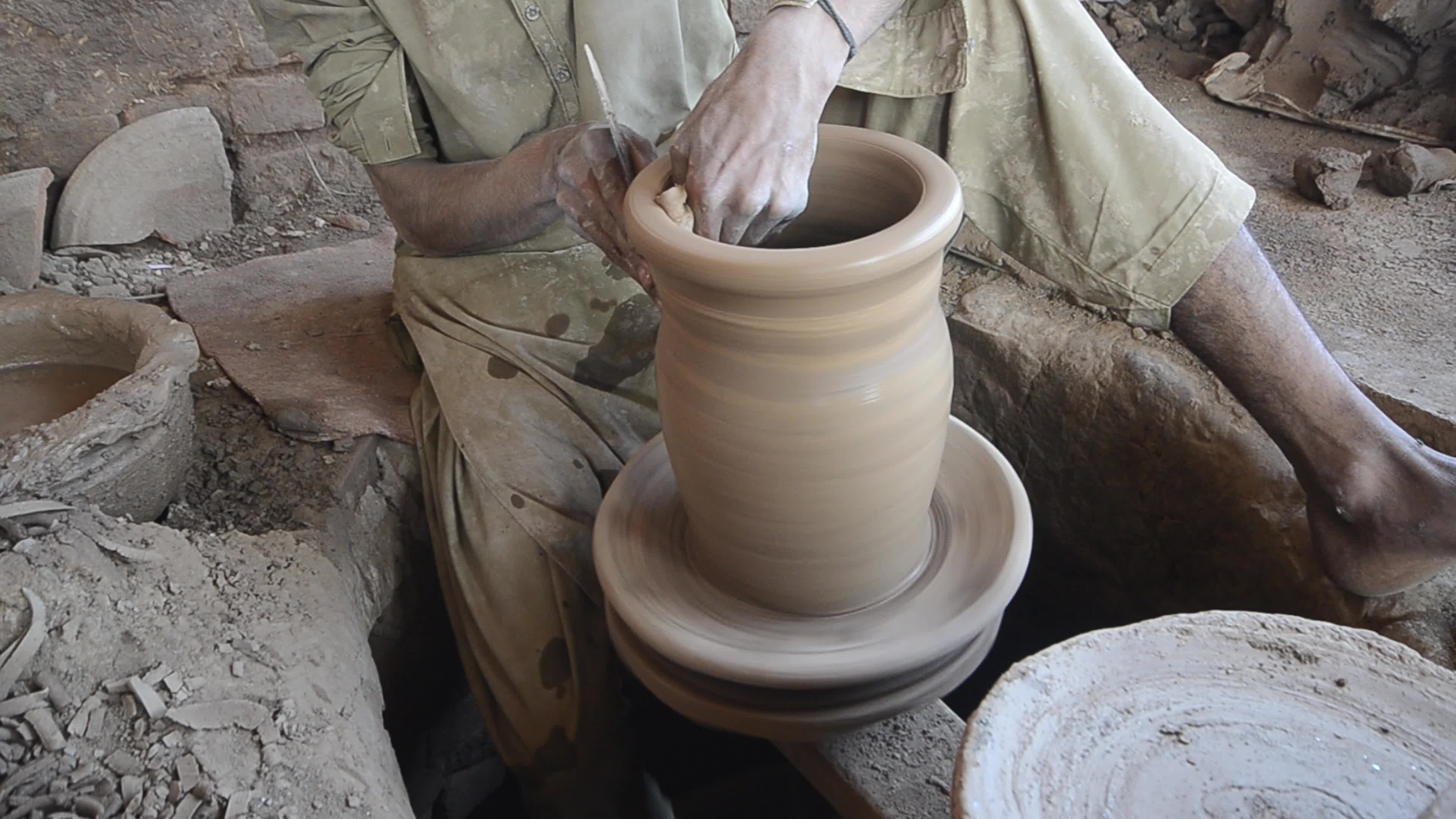 Laborers work on the eve of World Labor Day in Peshawar 