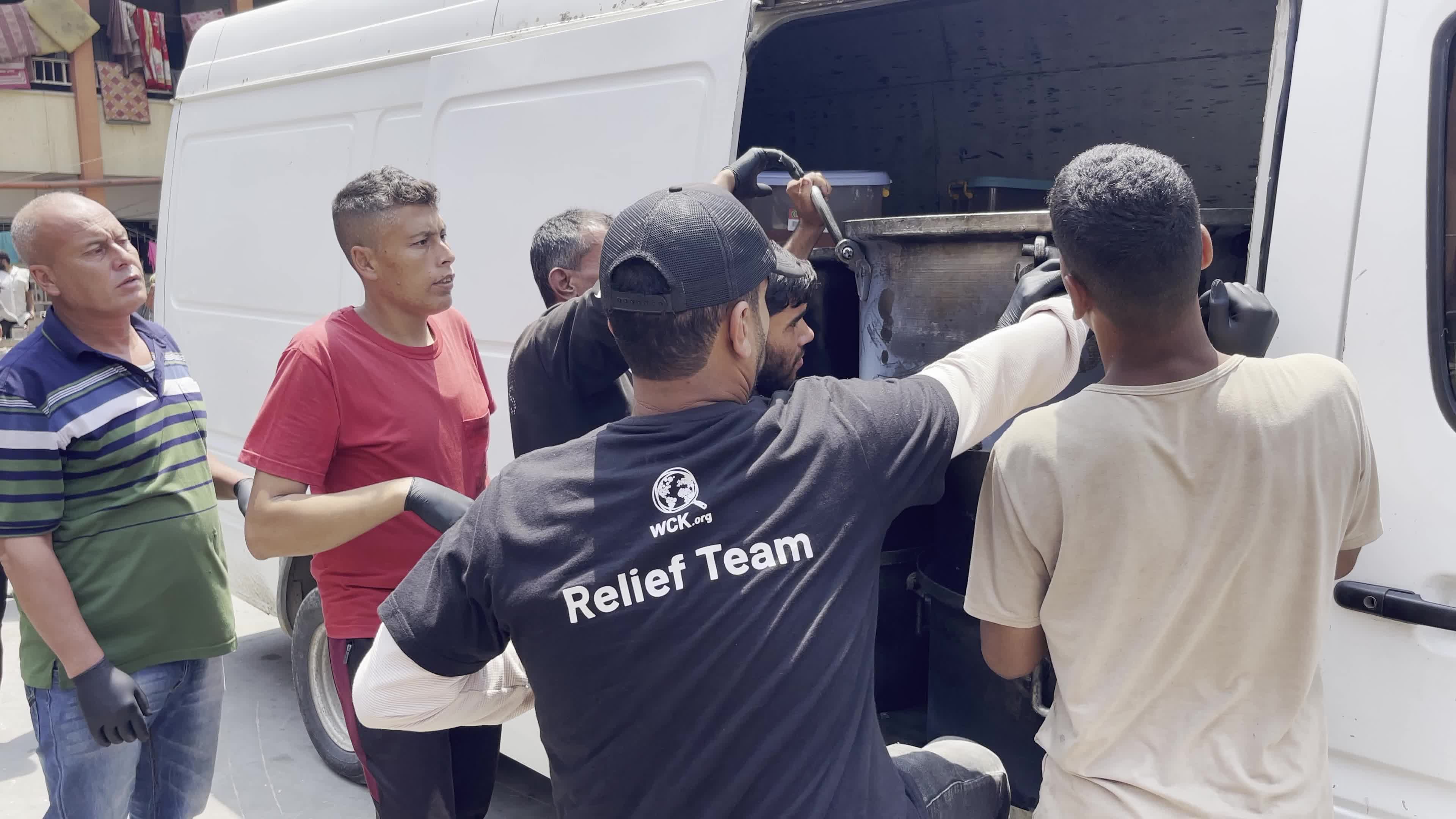 World Central Kitchen Aid Worker Serves Meals to Palestinians Amid Hamas-Israel Conflict