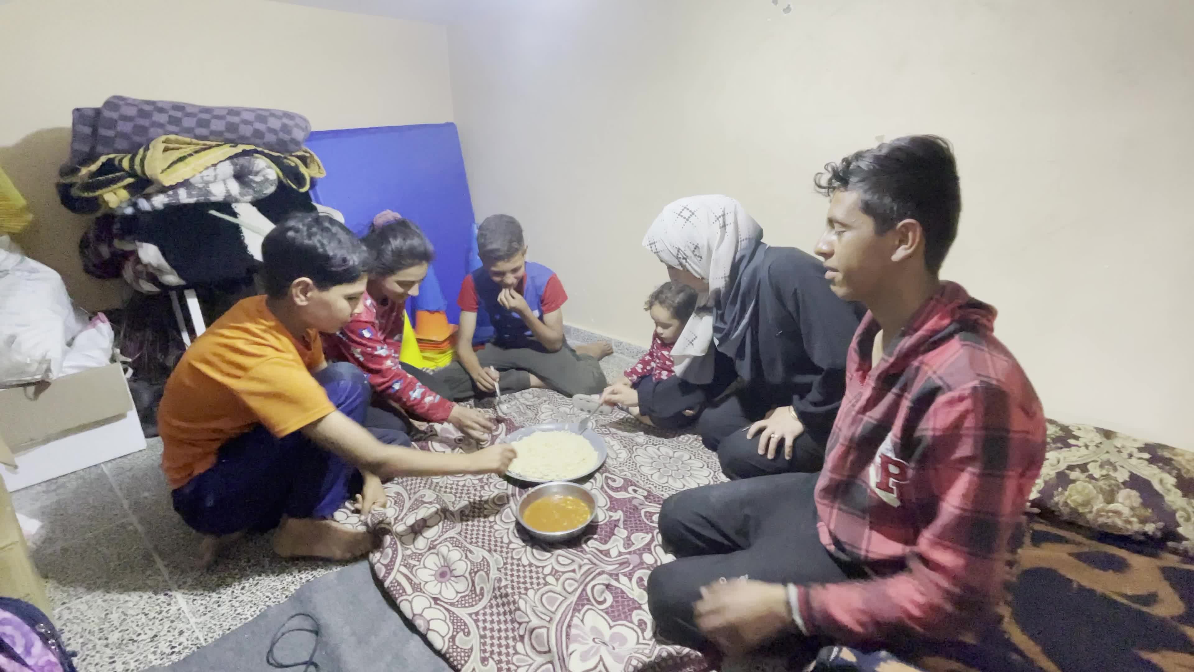 World Central Kitchen Aid Worker Serves Meals to Palestinians Amid Hamas-Israel Conflict