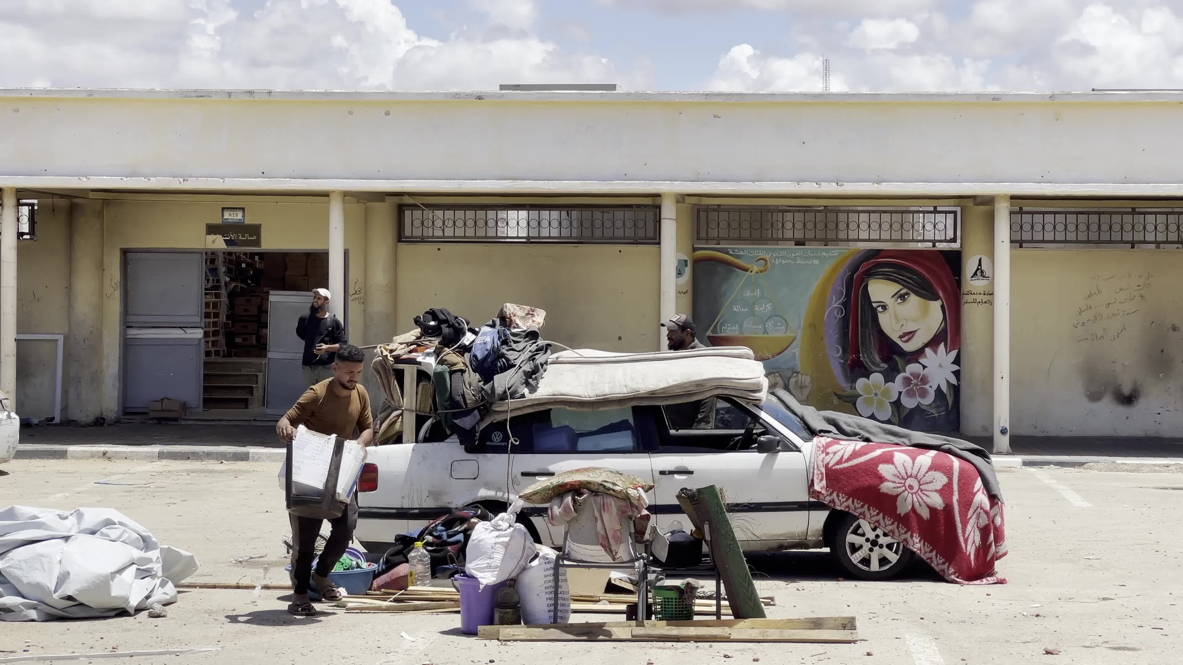 Displaced Palestinians Flee Rafah Following Evacuation Order