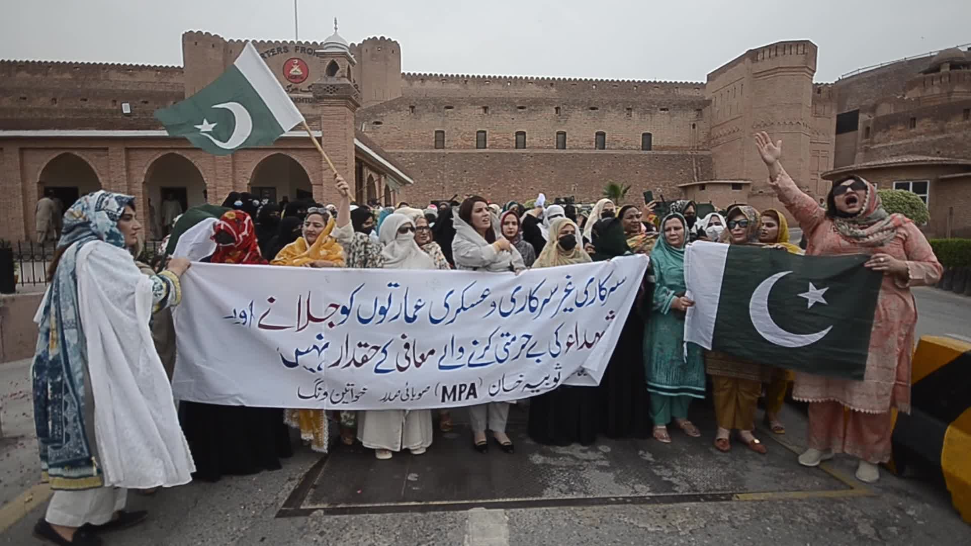 People attend a rally to mark the first anniversary of May 2023 riots, in Peshawar 