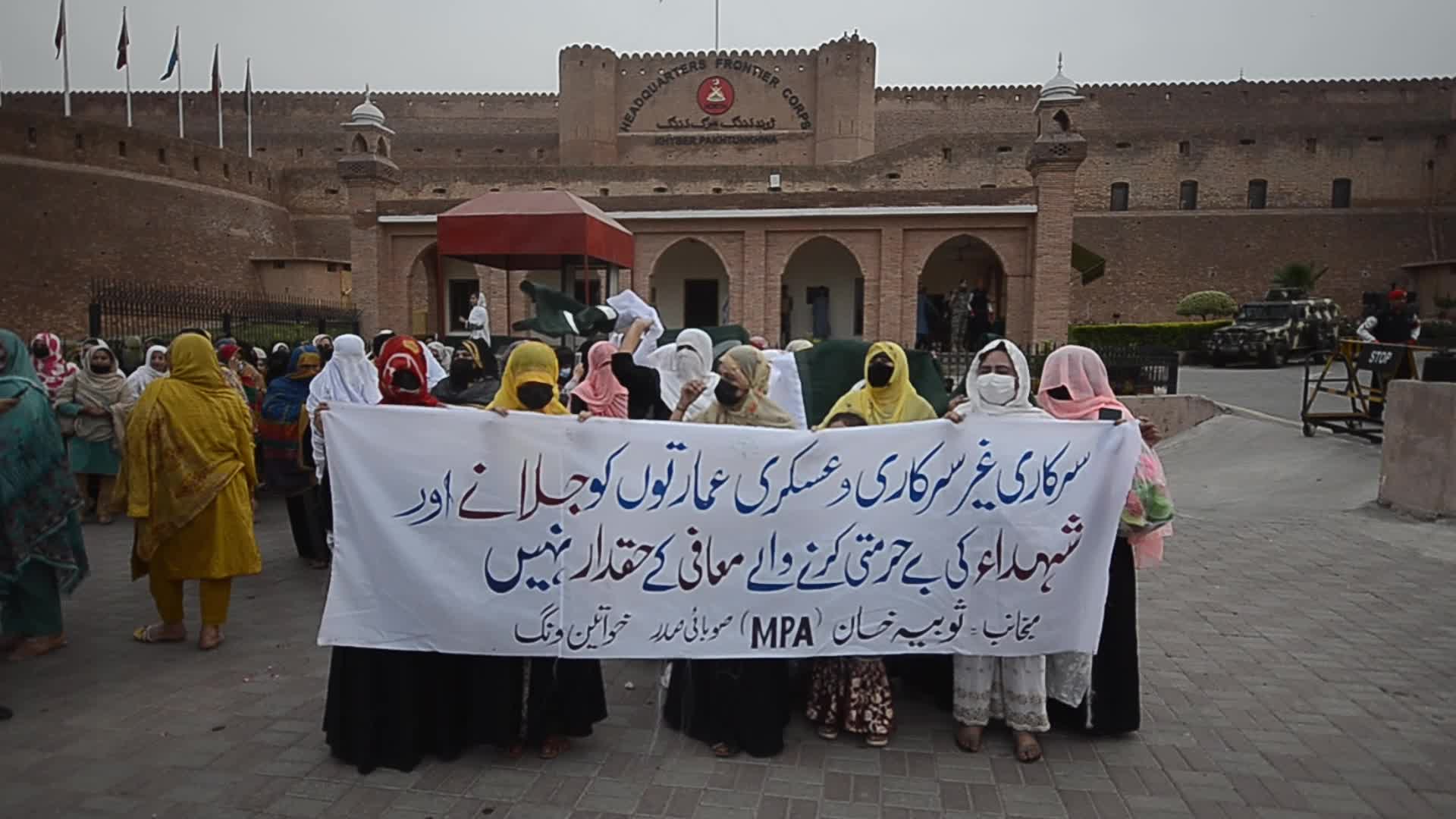People attend a rally to mark the first anniversary of May 2023 riots, in Peshawar 