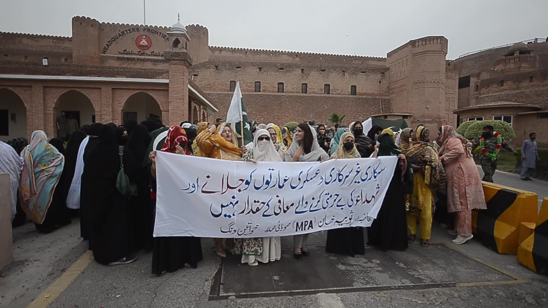 People attend a rally to mark the first anniversary of May 2023 riots, in Peshawar 