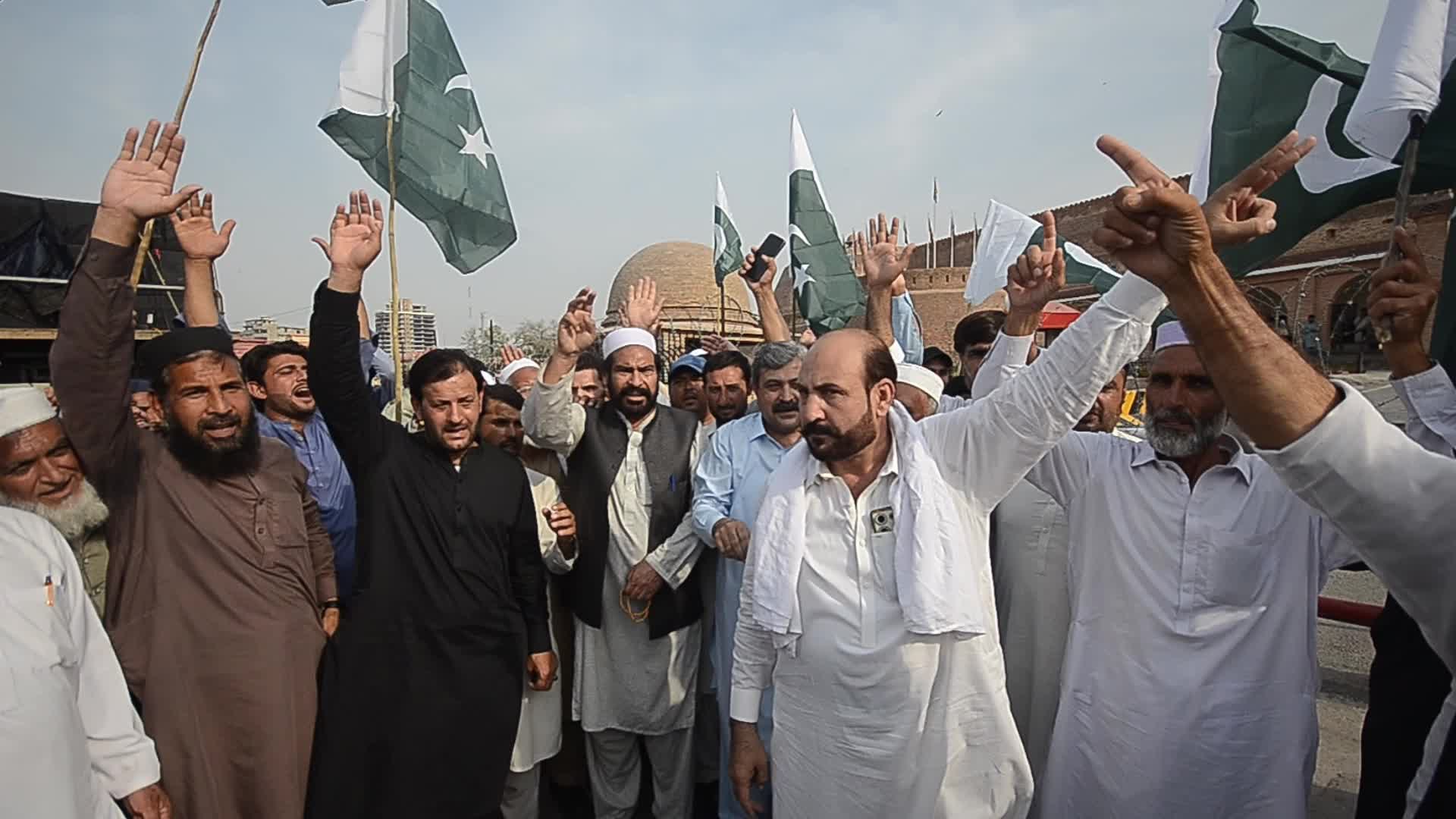 People attend a rally to mark the first anniversary of May 2023 riots, in Peshawar 