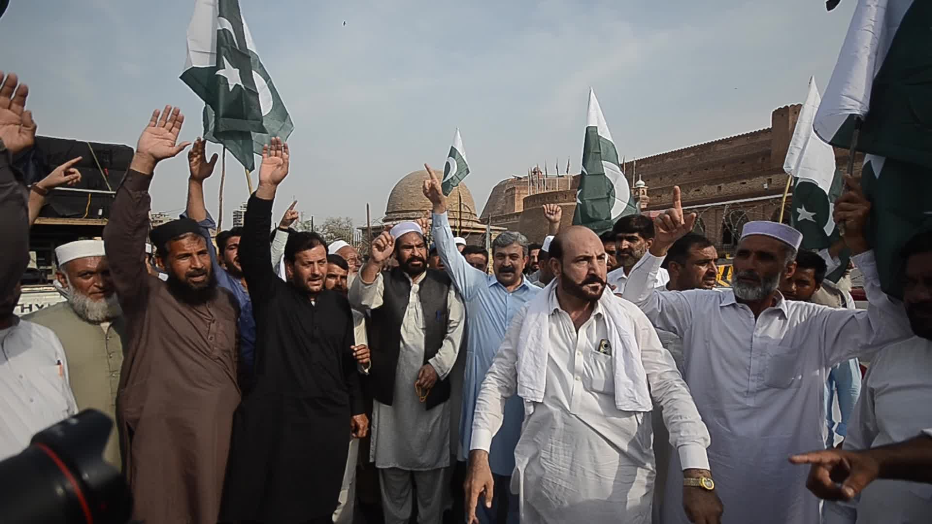 People attend a rally to mark the first anniversary of May 2023 riots, in Peshawar 